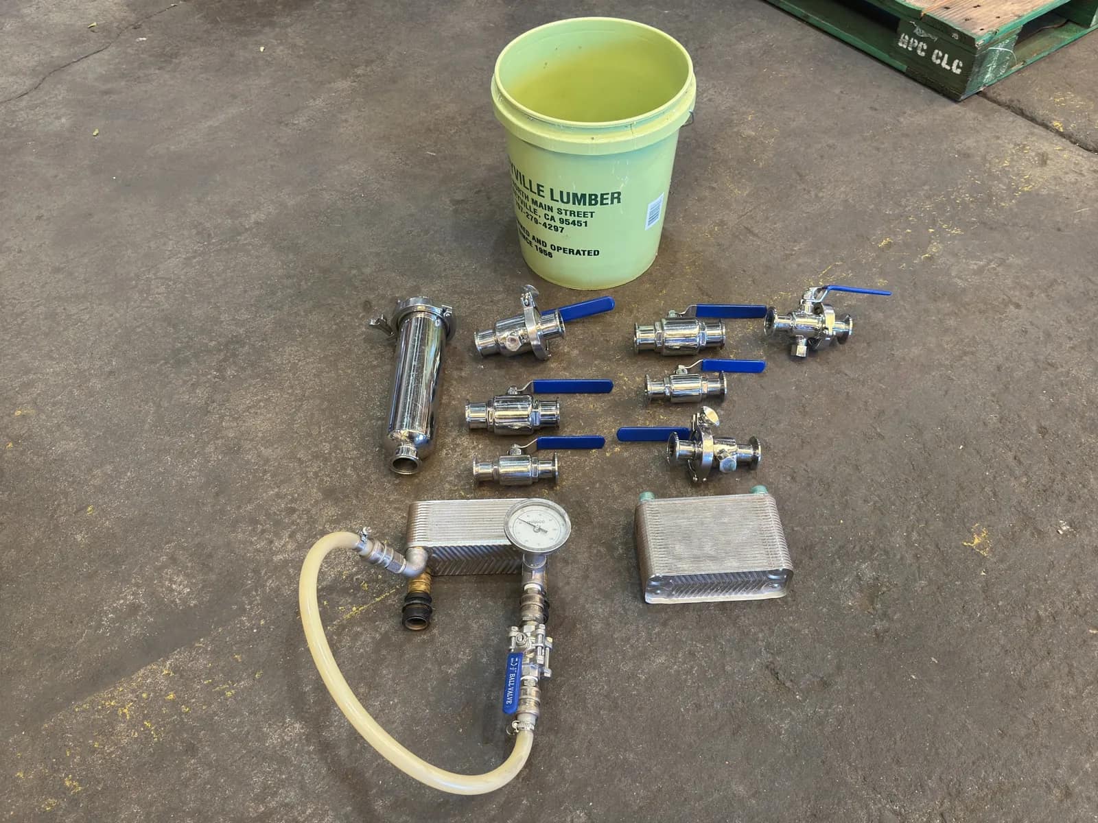 bucket-of-assorted-butterfly-valves-and-2-heat-exchangers-mppsmibh