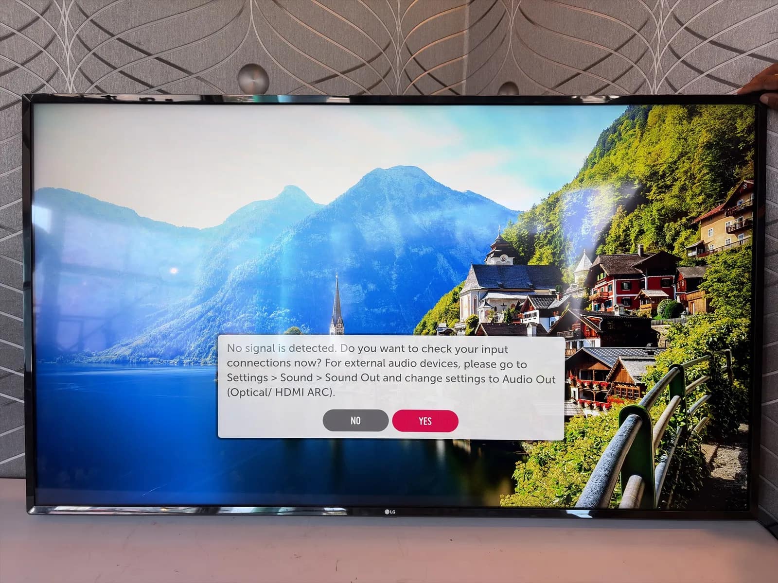 50-lg-tv-with-articulating-wall-mount-mpn33oq1