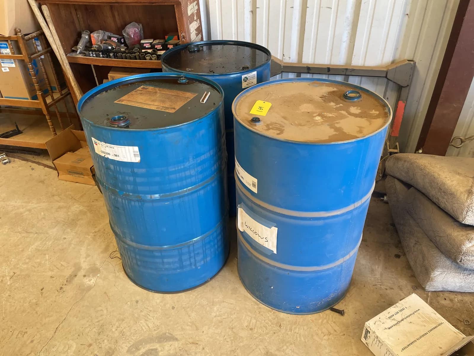 3-metal-drum-barrels-with-contents-almost-empty-mppyciqe