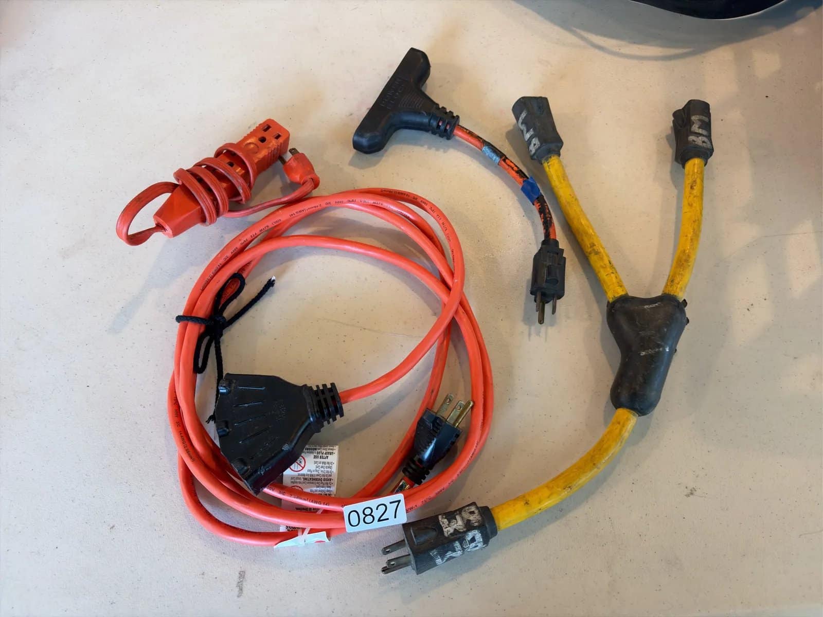 assorted-electrical-cords-and-adapters-with-multiple-connectors-343f8d