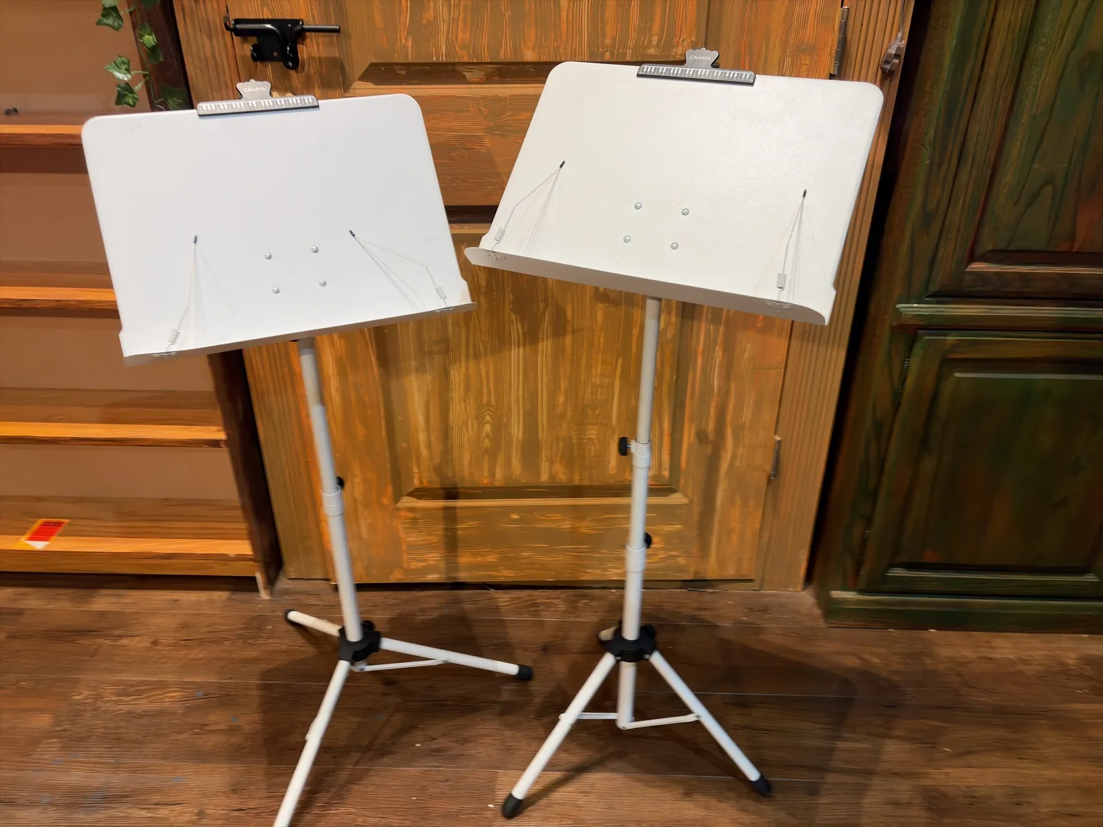 pair-of-white-metal-adjustable-music-stands-725f5e