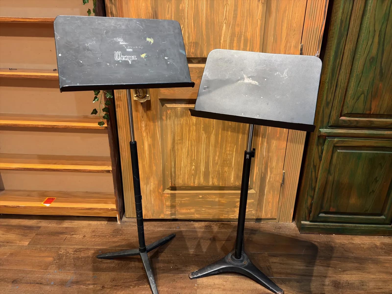 pair-of-black-metal-adjustable-music-stands-737e60