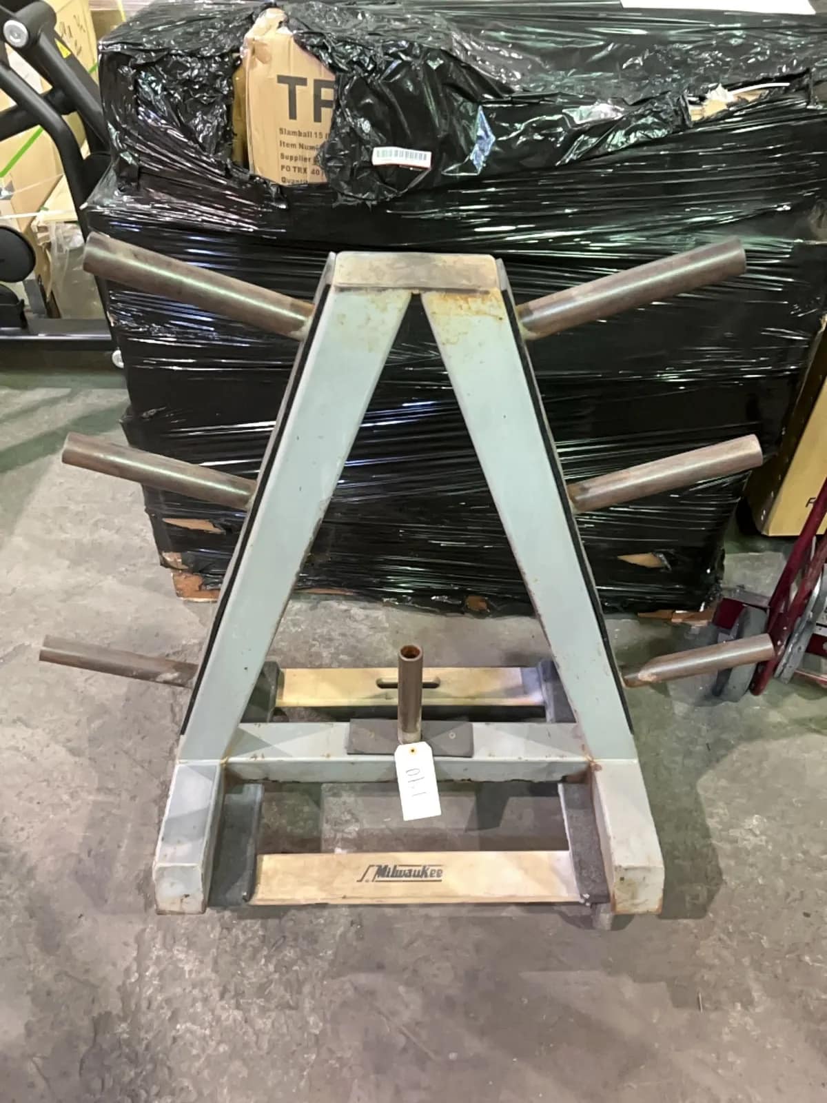 weight-plate-storage-rack-with-multiple-pegs-f940b5