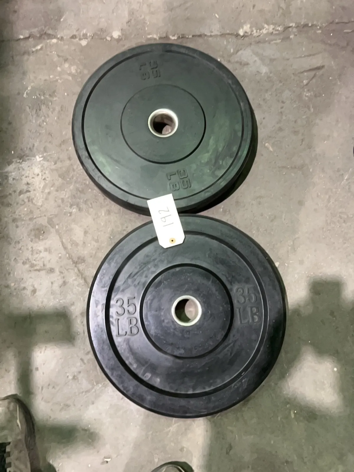 pair-of-35-lb-rubber-weight-plates-3f374e