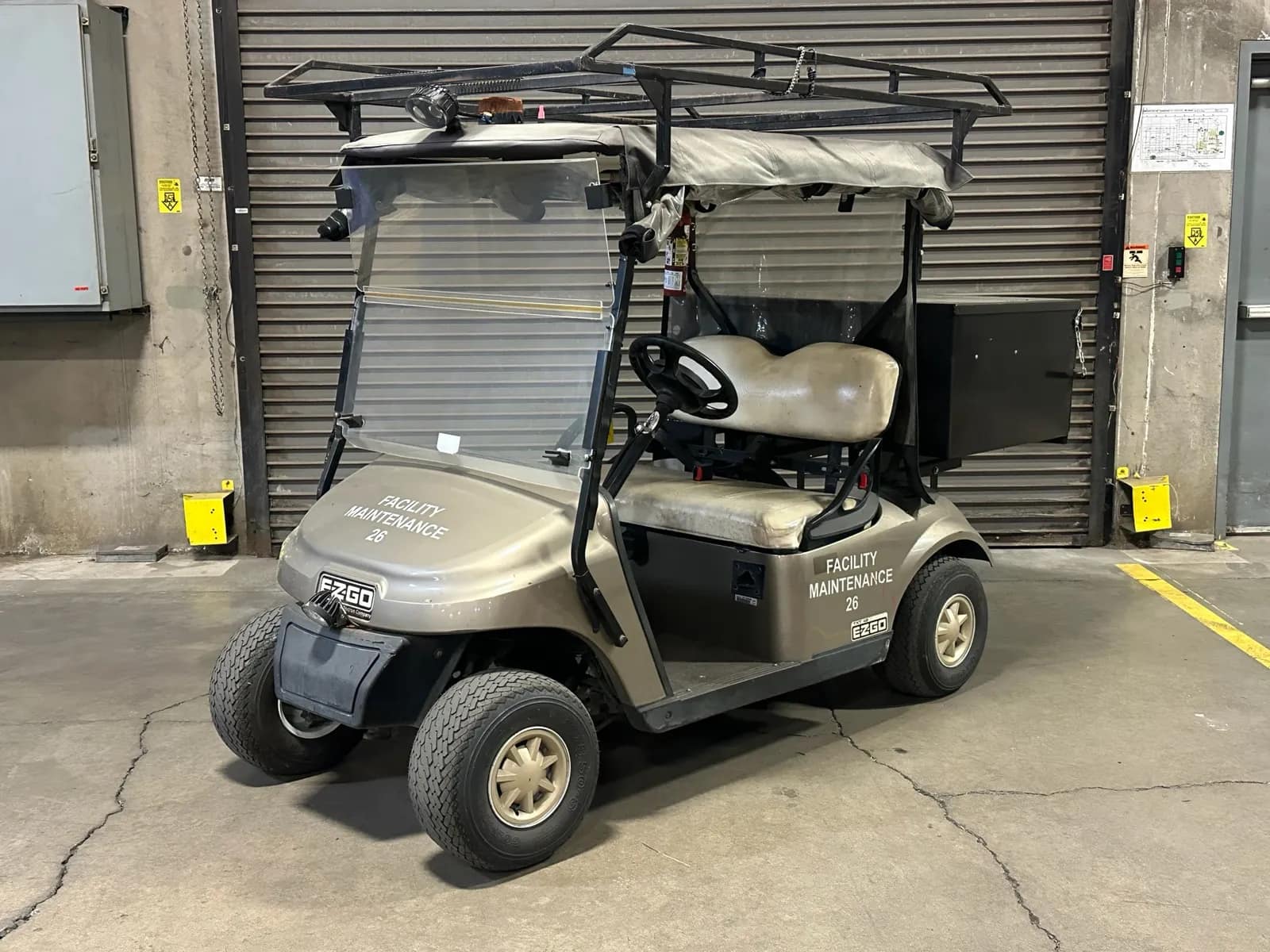 ez-go-txt48-electric-golf-cart-with-mounted-storage-box-and-top-rack-46cd87