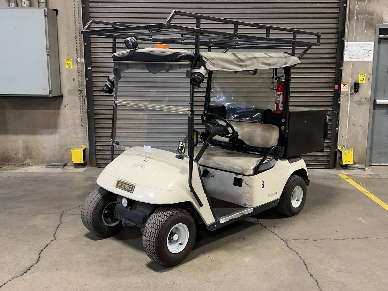ez-go-electric-golf-cart-with-charger-mounted-storage-box-toolbox-and-top-rack-mrl4zu32