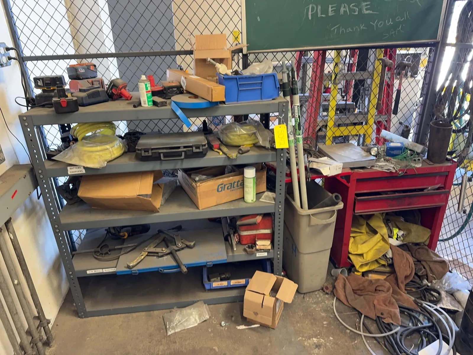 contents-of-corner-toolbox-rack-tool-batteries-puller-tools-hole-drill-bits-hammers-and-trashcan-mrdq5k0l