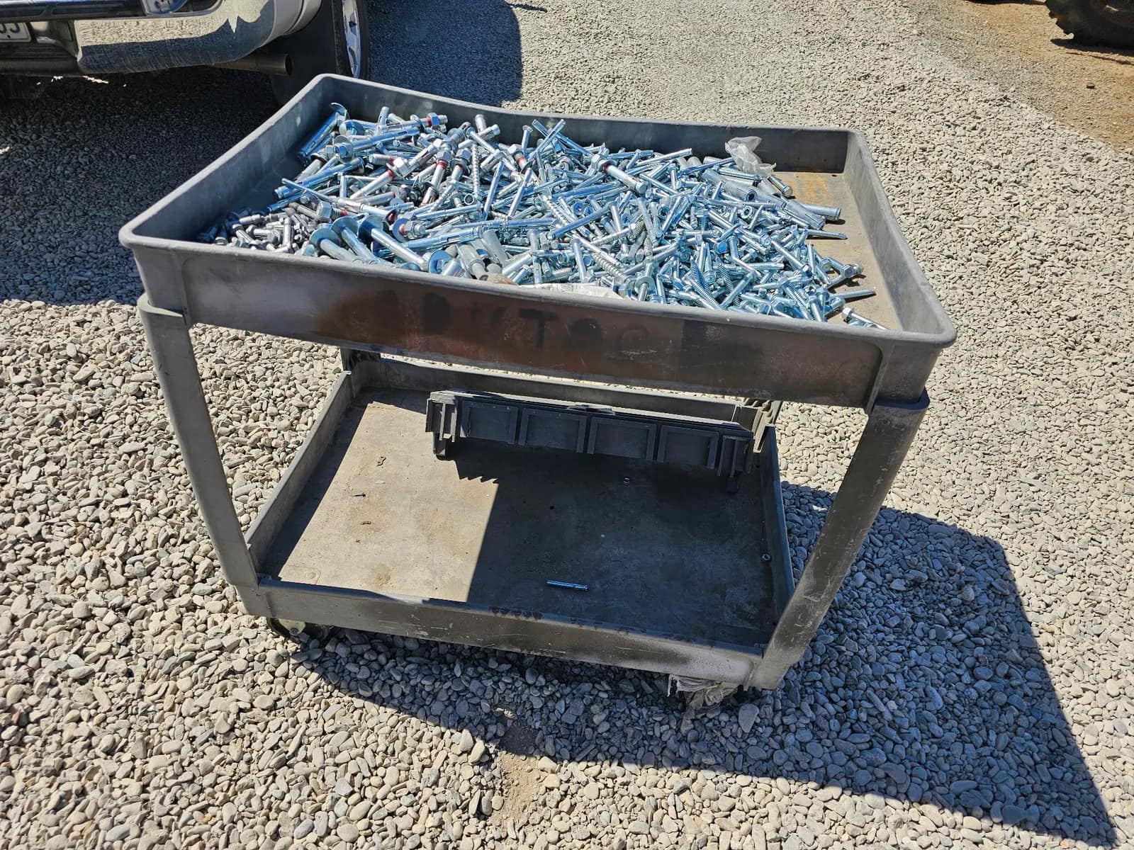 metal-utility-cart-loaded-with-assorted-screws-0670c9