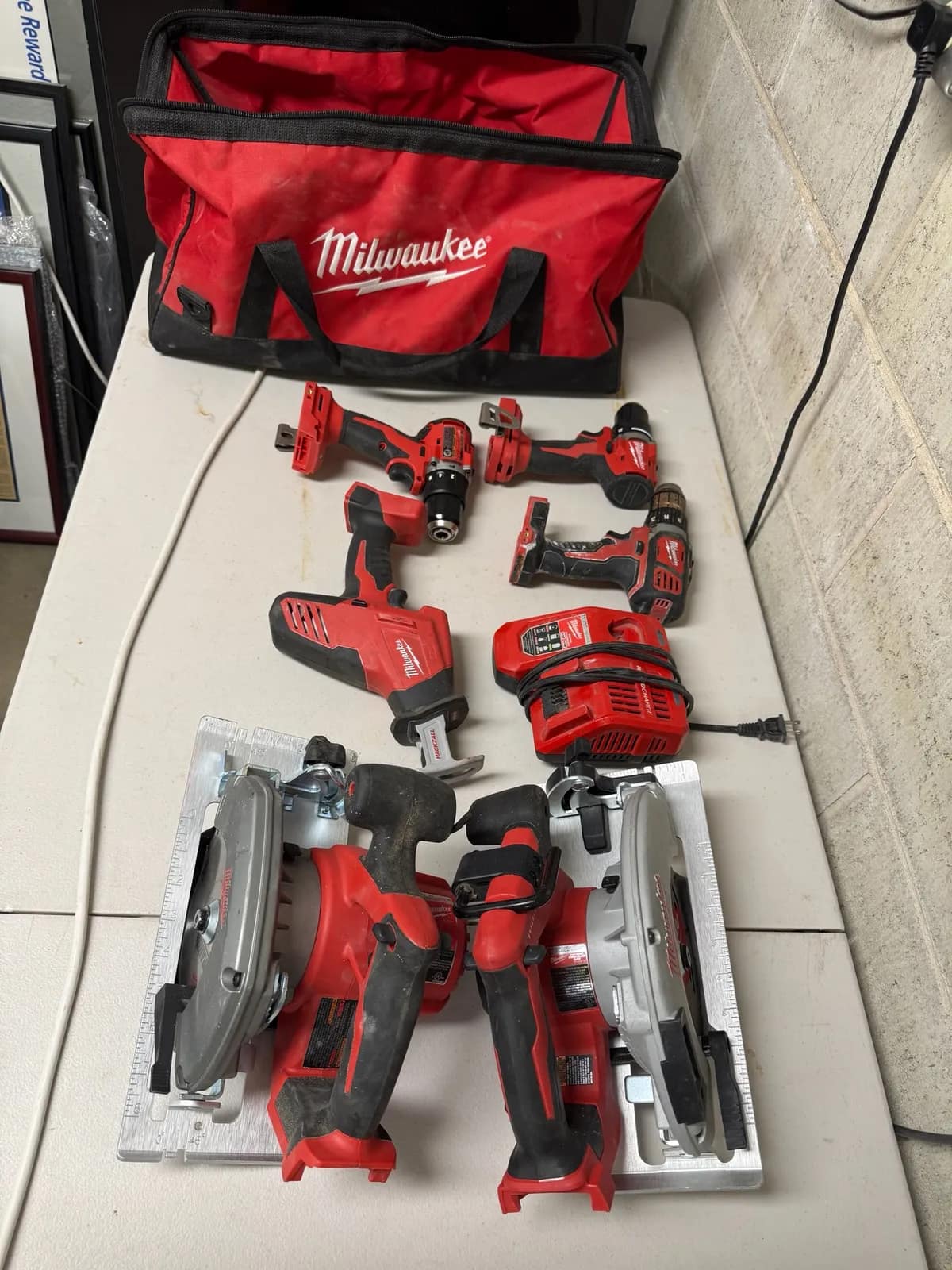 milwaukee-tool-set-with-bag-drills-saws-and-accessories-3fcf38