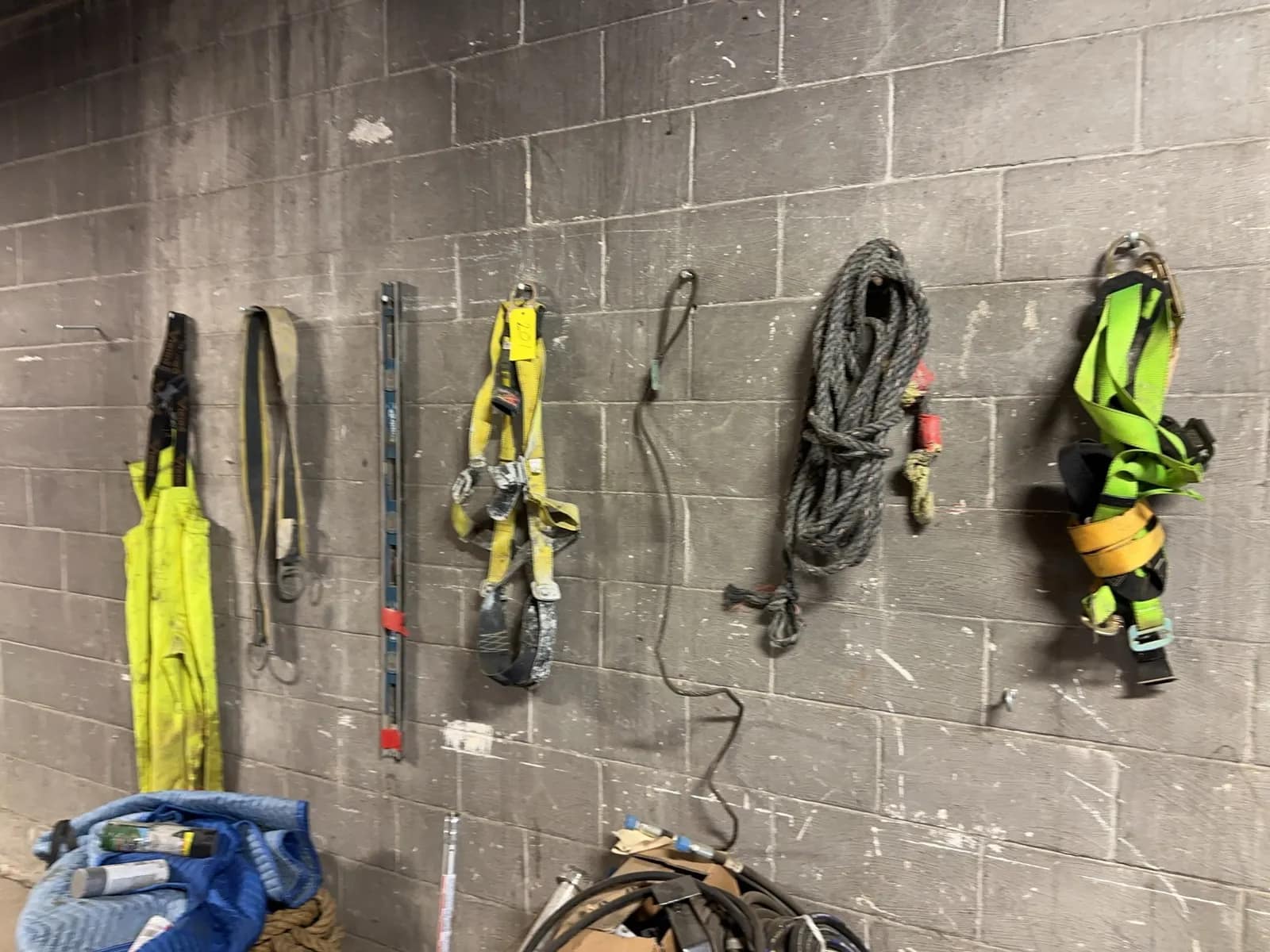 contents-of-wall-safety-harness-rope-overalls-and-level-237c4e