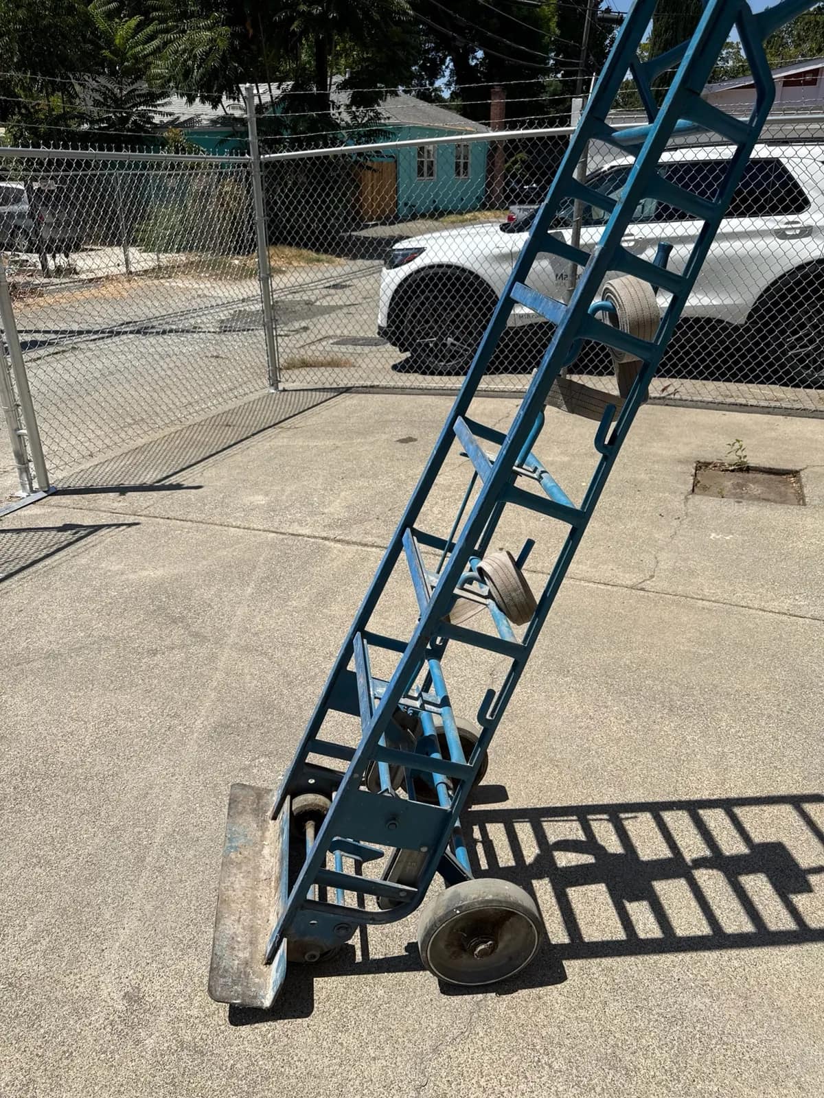 heavy-duty-blue-steel-dolly-with-rubber-wheels-18a1c3