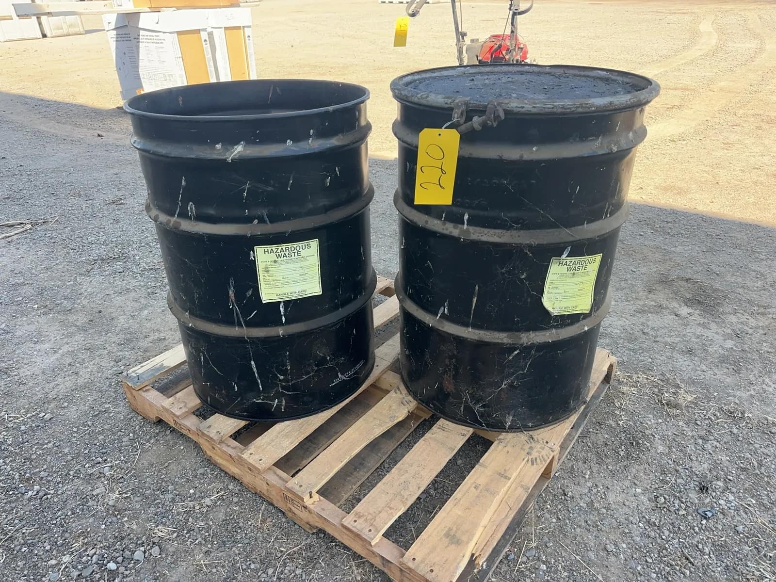 2-hazardous-waste-barrels-with-used-oil-filters-2f1d7a