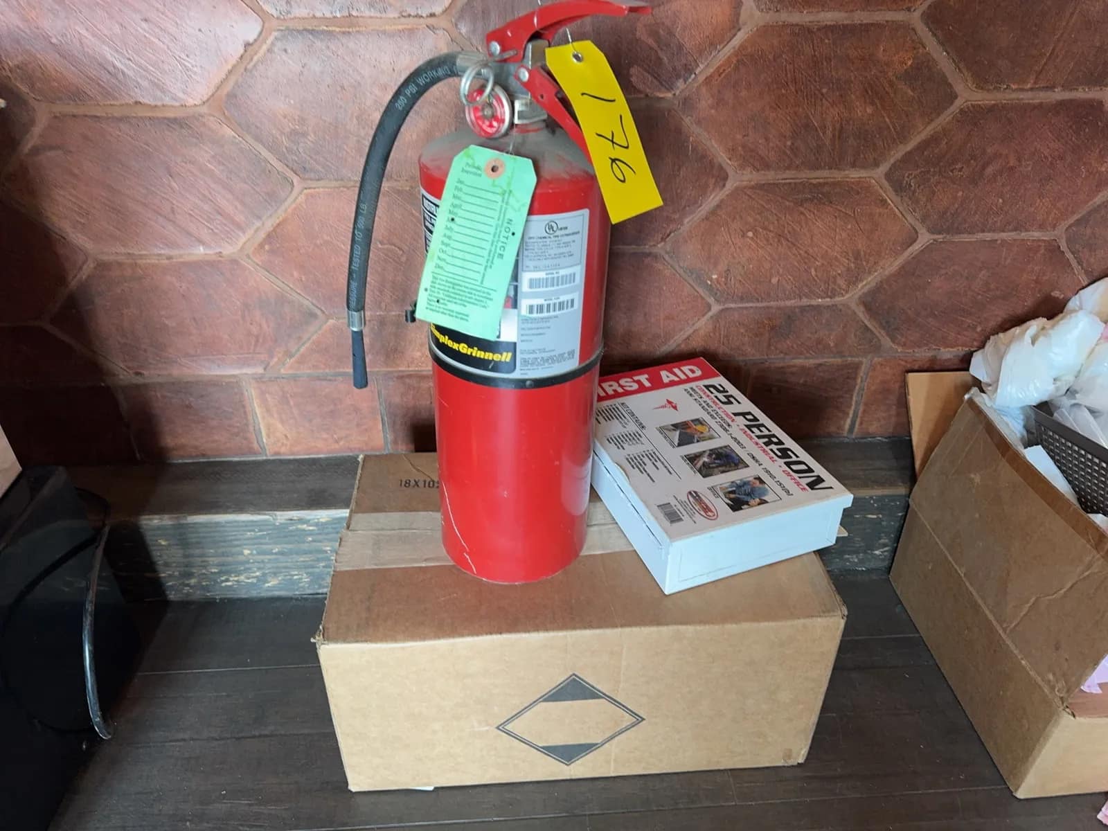 3-fire-extinguishers-and-first-aid-kit-243480