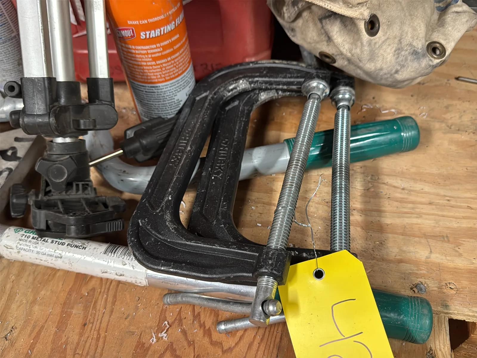 Contents Of Corner: Pipe Bender Heads, Gas Torch, C-Clamps, GreenLee 710 Metal Stud Punch, And Glove Bags, photo 2 of 11