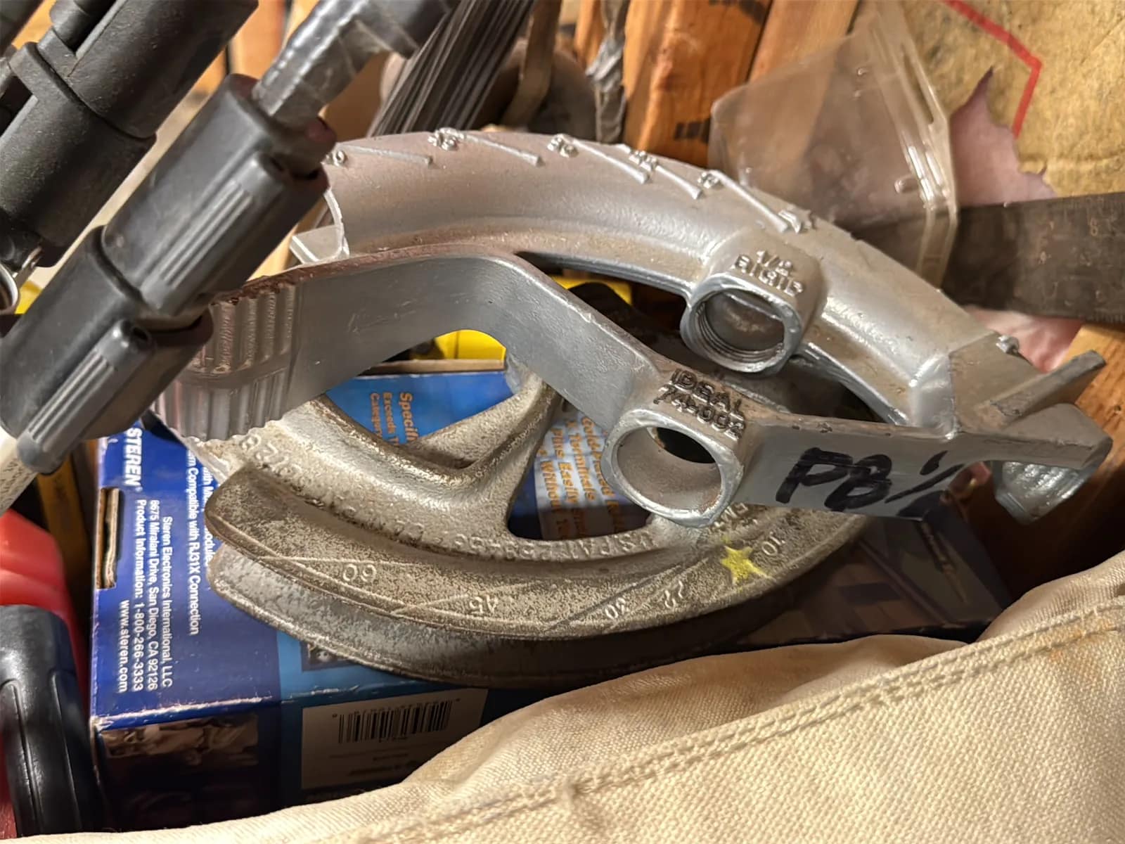 Contents Of Corner: Pipe Bender Heads, Gas Torch, C-Clamps, GreenLee 710 Metal Stud Punch, And Glove Bags, photo 7 of 11