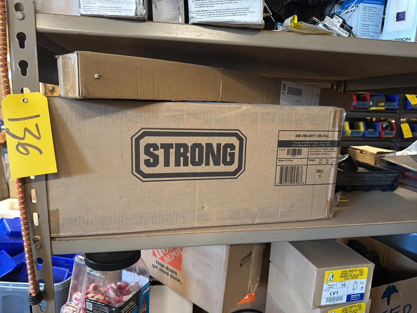 Contents Of (1) Shelf: Assorted Electrical Supply, Articulating Mount, Locks And More, photo 1 of 7