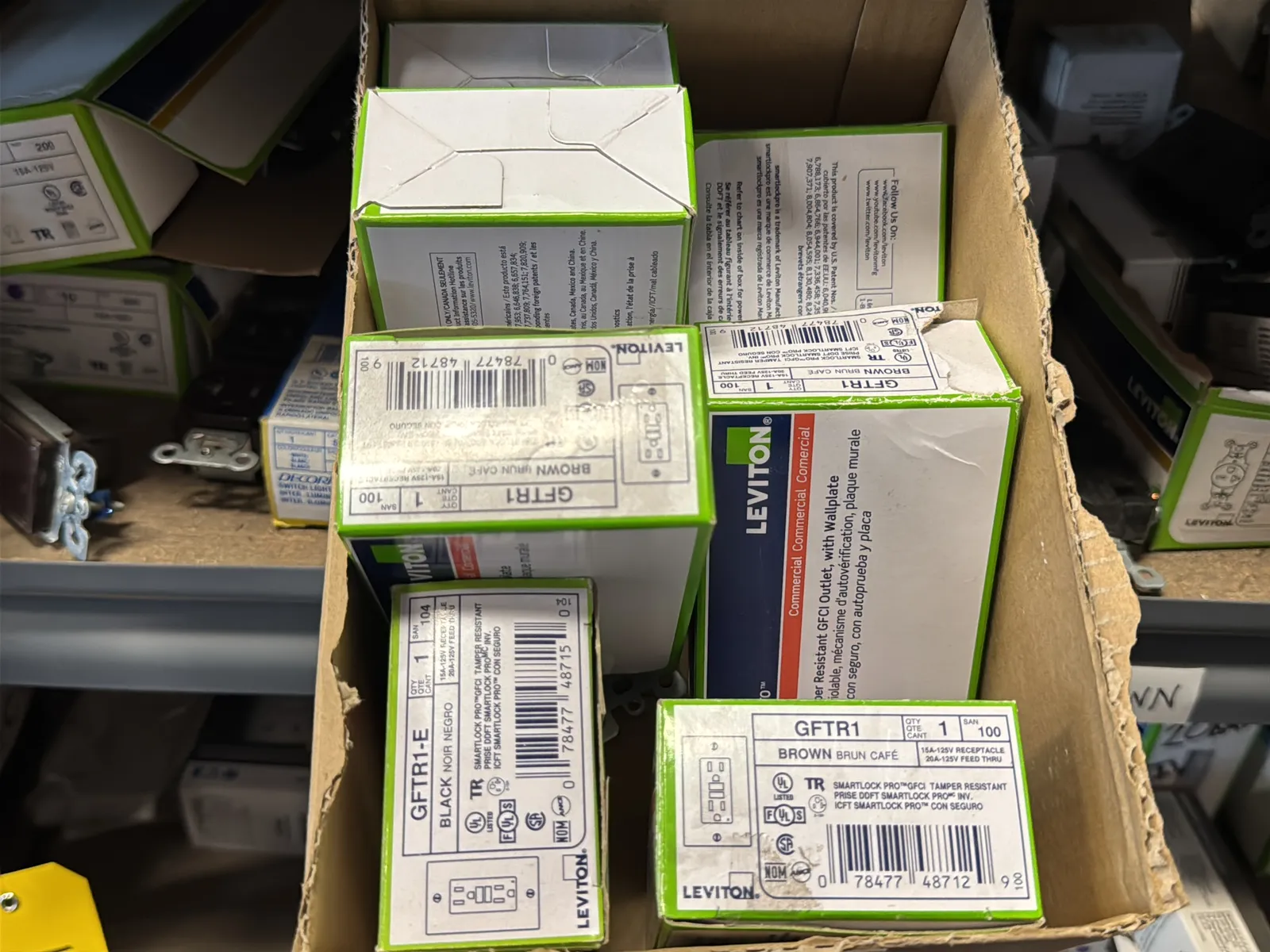 Contents Of (1) Shelf: Leviton Switches, Lutron Switches, Switch Plates And More, photo 3 of 12