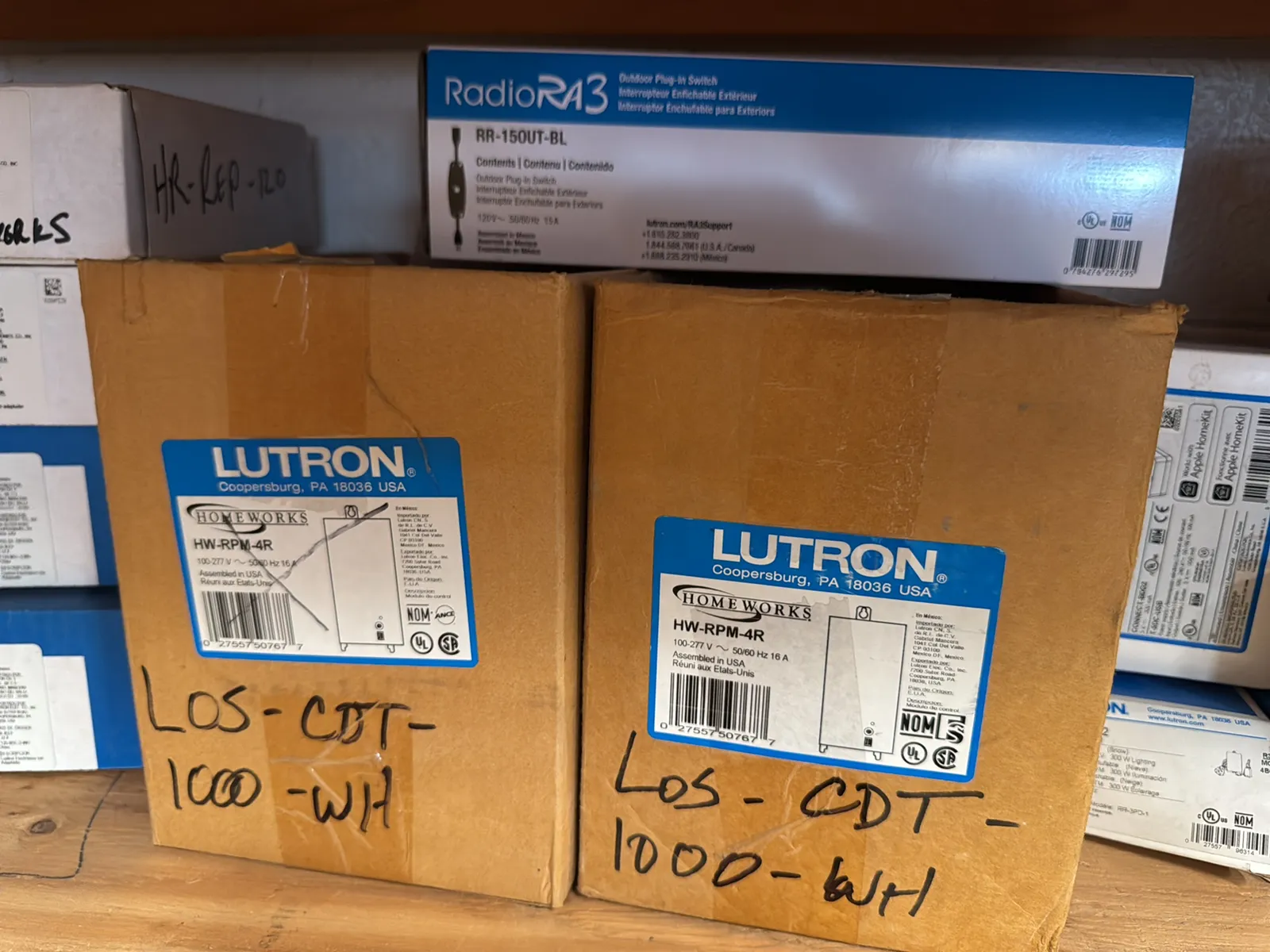 Contents Of (1) Shelf: Assorted Lutron Accessories, Landing Boards, Dimming Modules, Switches And More, photo 6 of 10