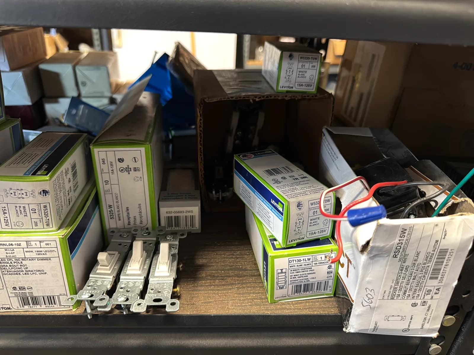 Contents Of (1) Shelf: Leviton Switches , Lutron Switches, Assorted Hardware And Mote, photo 5 of 11