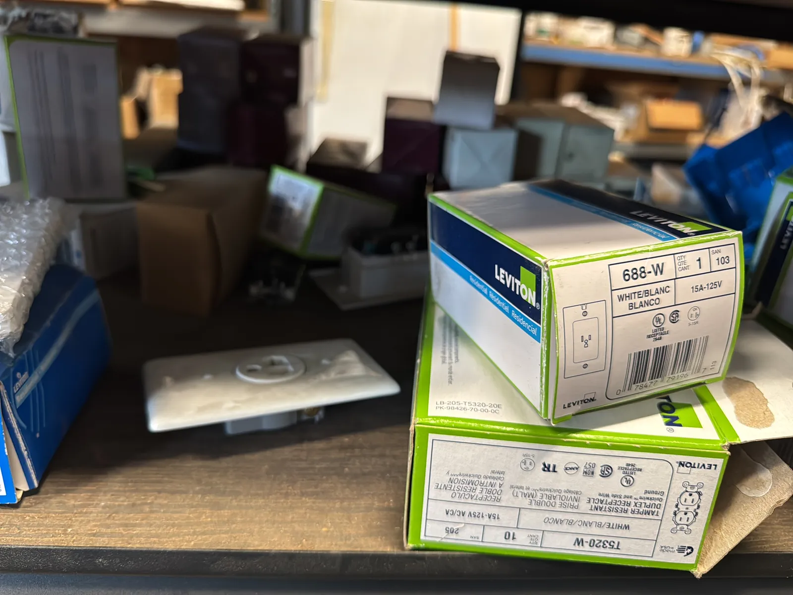Contents Of (1) Shelf: Leviton Switches , Lutron Switches, Assorted Hardware And Mote, photo 3 of 11