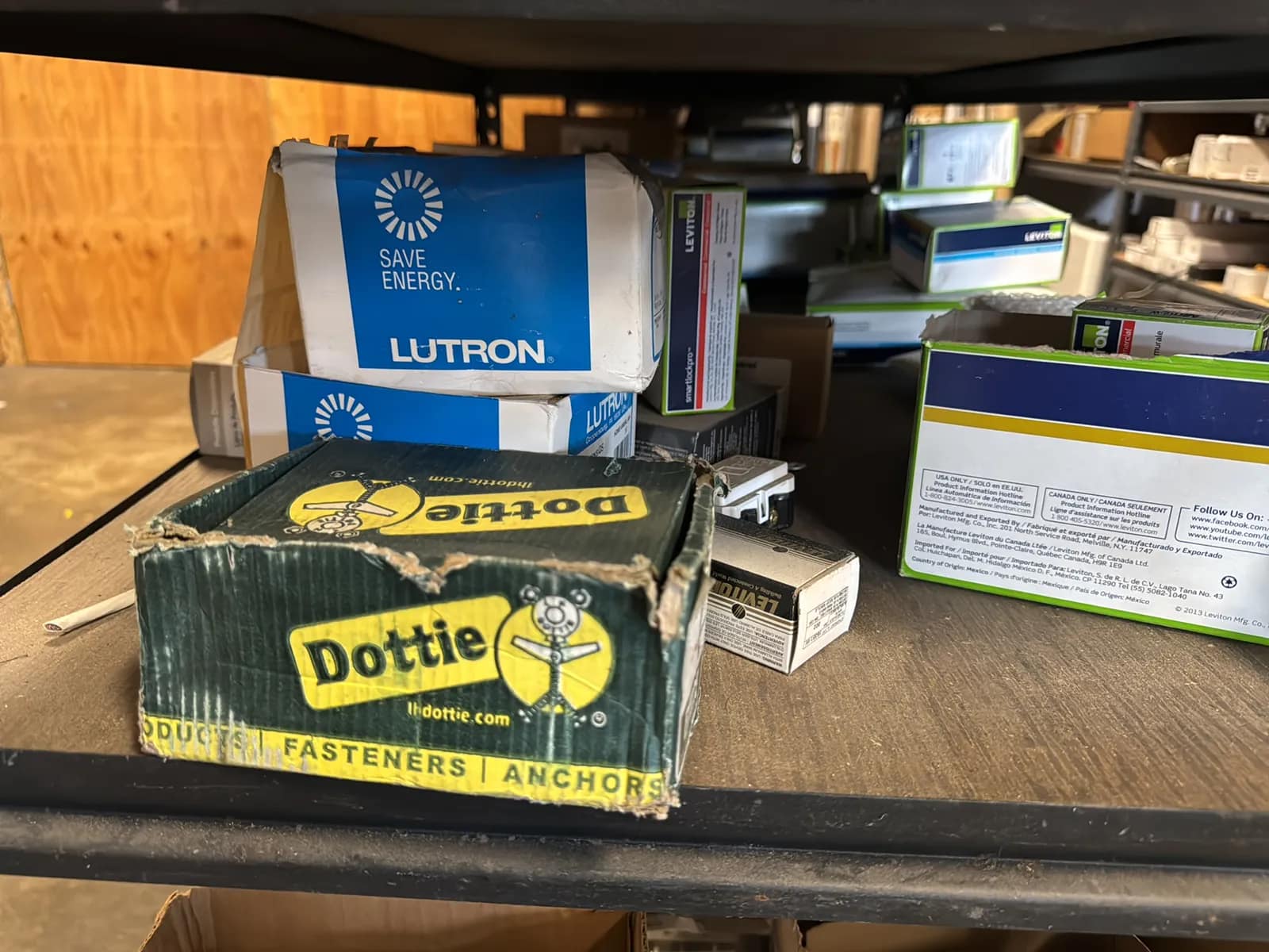 Contents Of (1) Shelf: Leviton Switches , Lutron Switches, Assorted Hardware And Mote, photo 6 of 11