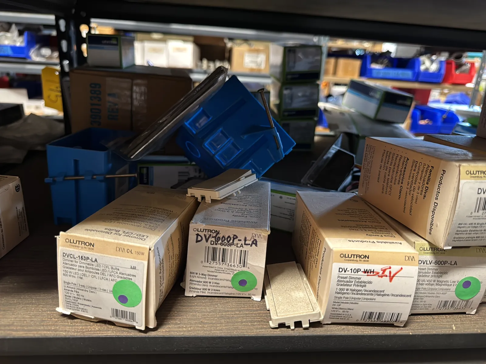 Contents Of (1) Shelf: Leviton Switches , Lutron Switches, Assorted Hardware And Mote, photo 10 of 11
