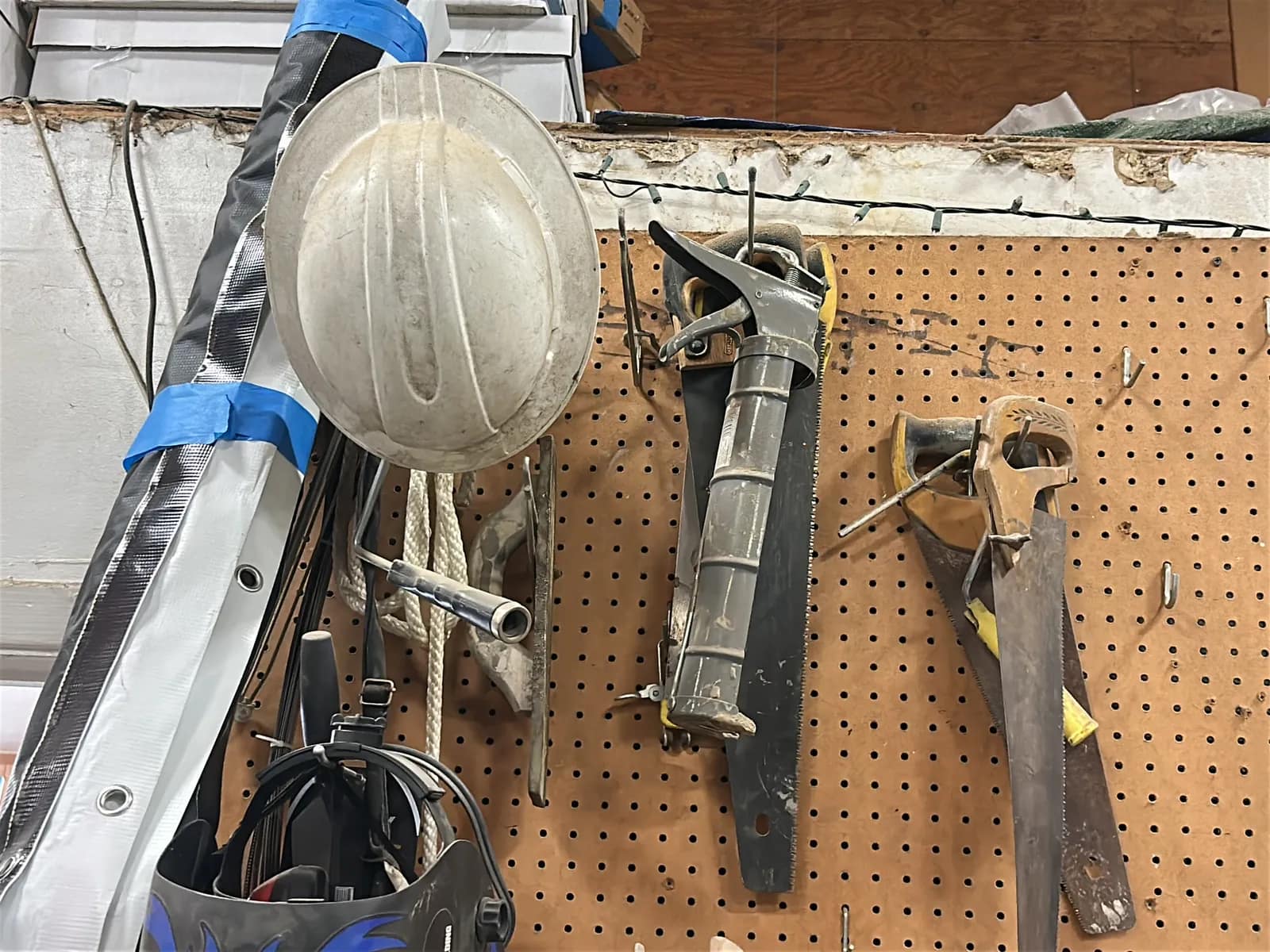 Pegboard And Contents: Welding Mask, Hand Saws, Caulking Gun And More, photo 4 of 6