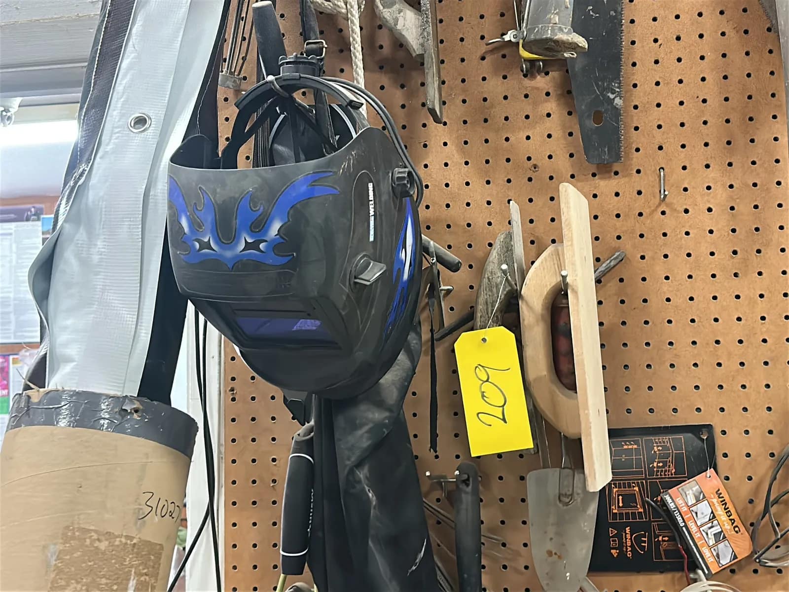 Pegboard And Contents: Welding Mask, Hand Saws, Caulking Gun And More, photo 2 of 6