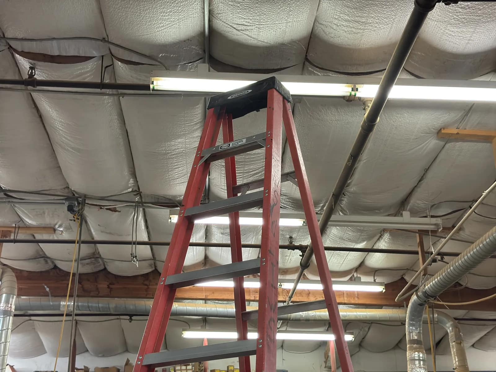 Werner 12’ Fiberglass Ladder, photo 2 of 9