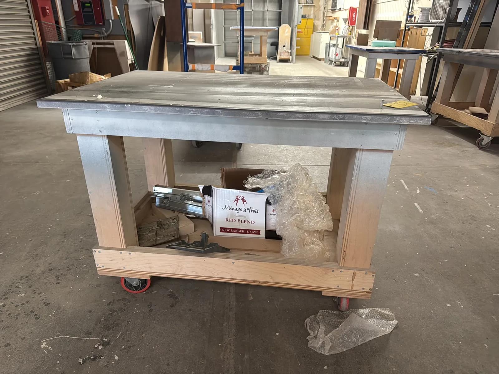 Custom Rolling Wood Shop Table With Contents: Assorted Cabinet Hardware, photo 2 of 9