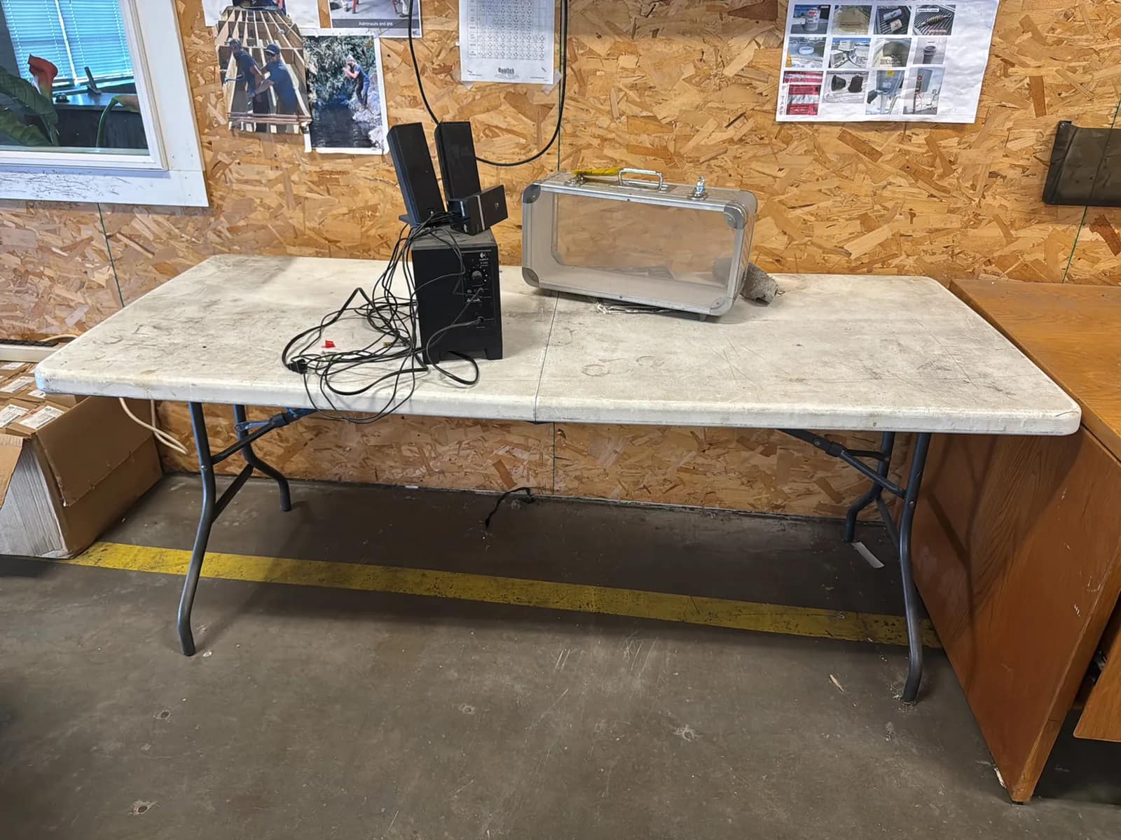 6-folding-table-with-logitech-x-240x-stereo-amplifier-and-patron-tequila-case-d95e0e