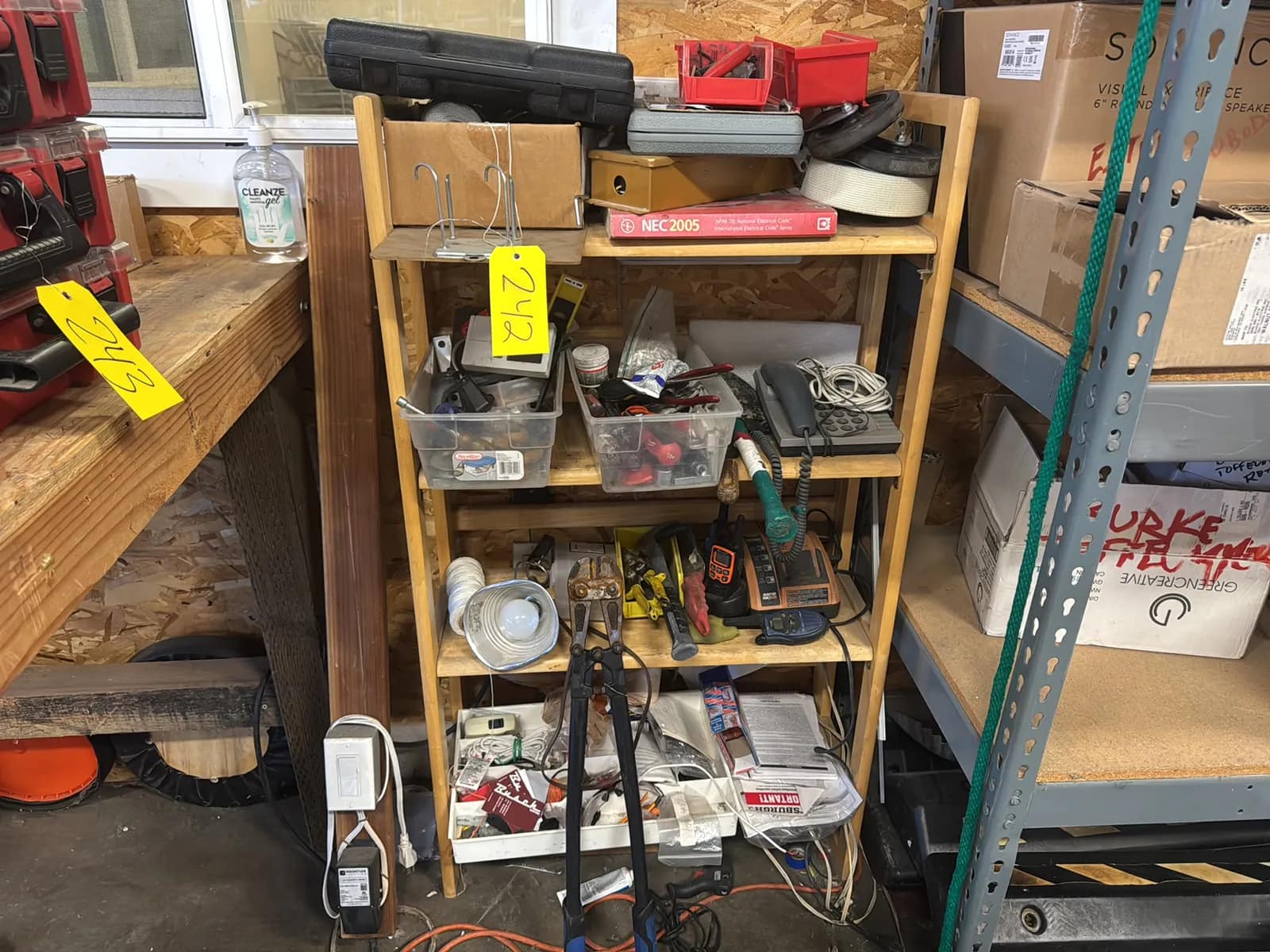 shelf-with-contents-assorted-hand-tools-casters-and-more-68aaaf