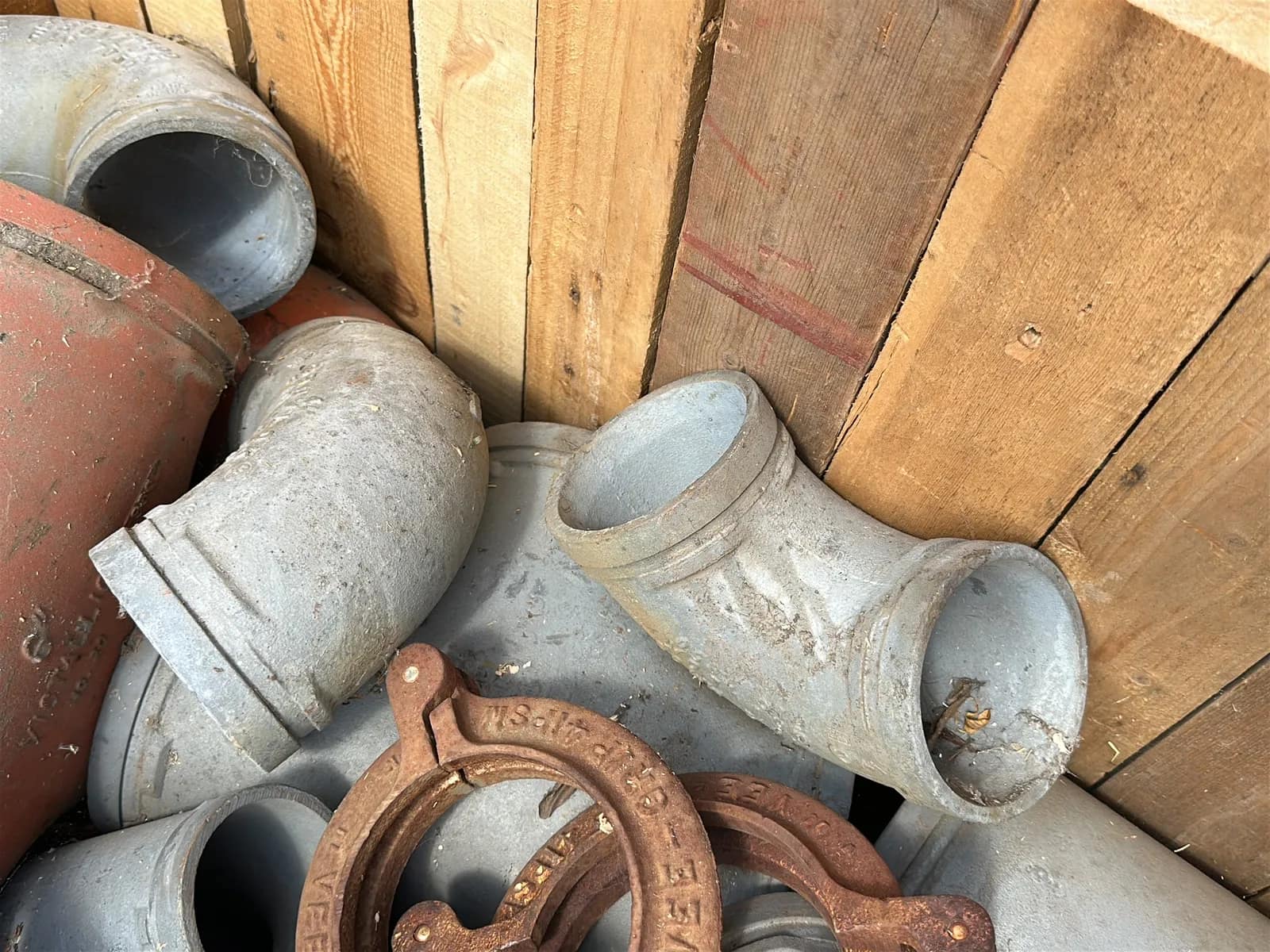 Crate and Contents: Assorted Pipe Clamps, Steel Elbows, Steel Couplers, And More, photo 6 of 6