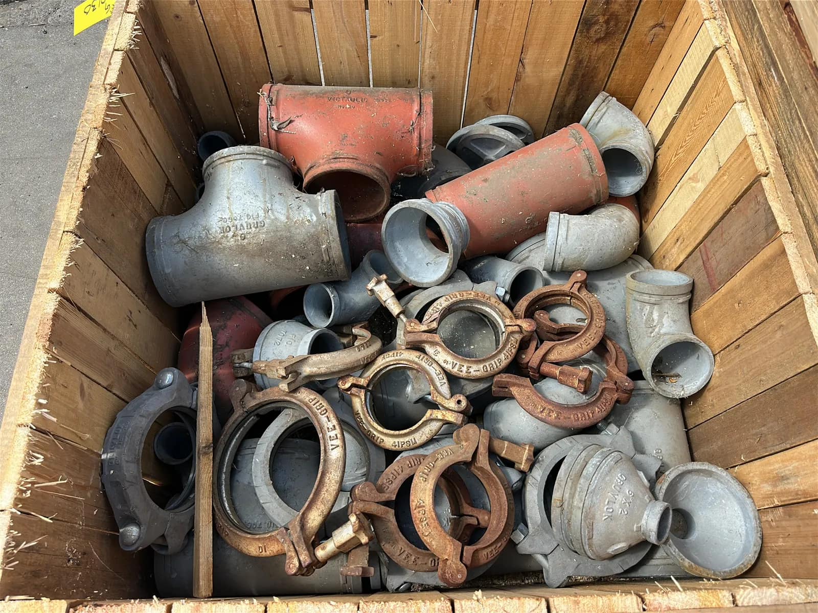 Crate and Contents: Assorted Pipe Clamps, Steel Elbows, Steel Couplers, And More, photo 3 of 6