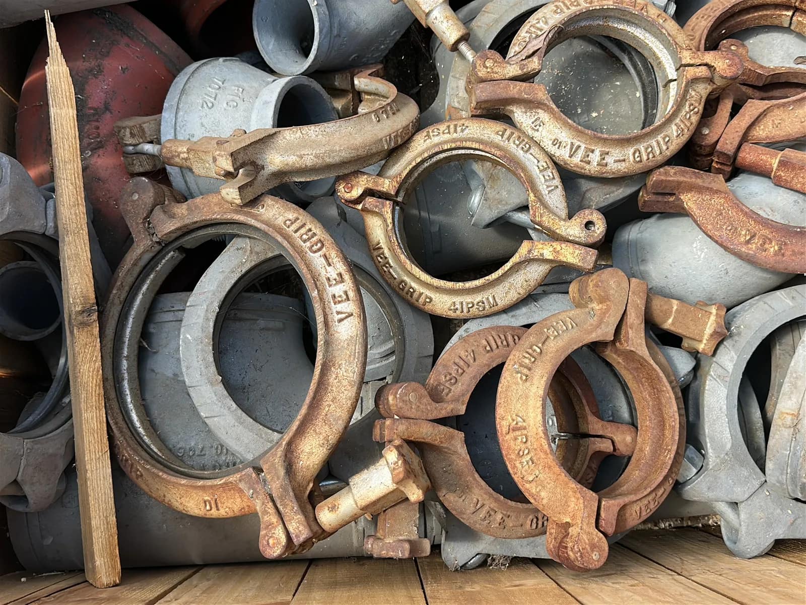 Crate and Contents: Assorted Pipe Clamps, Steel Elbows, Steel Couplers, And More, photo 5 of 6