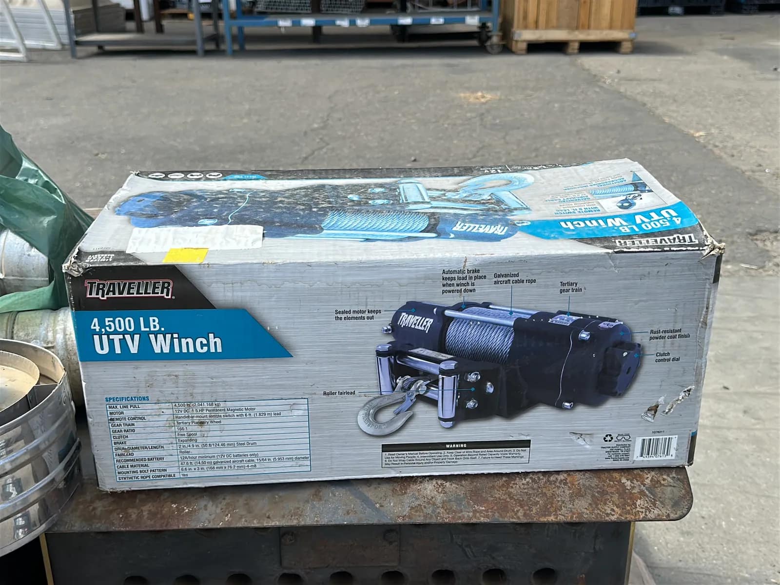 Contents Of Pallet: (2) Wood Burning Furnaces, Traveller 4,500Lb UTV Winch, (2) Car Batteries, And More, photo 6 of 10