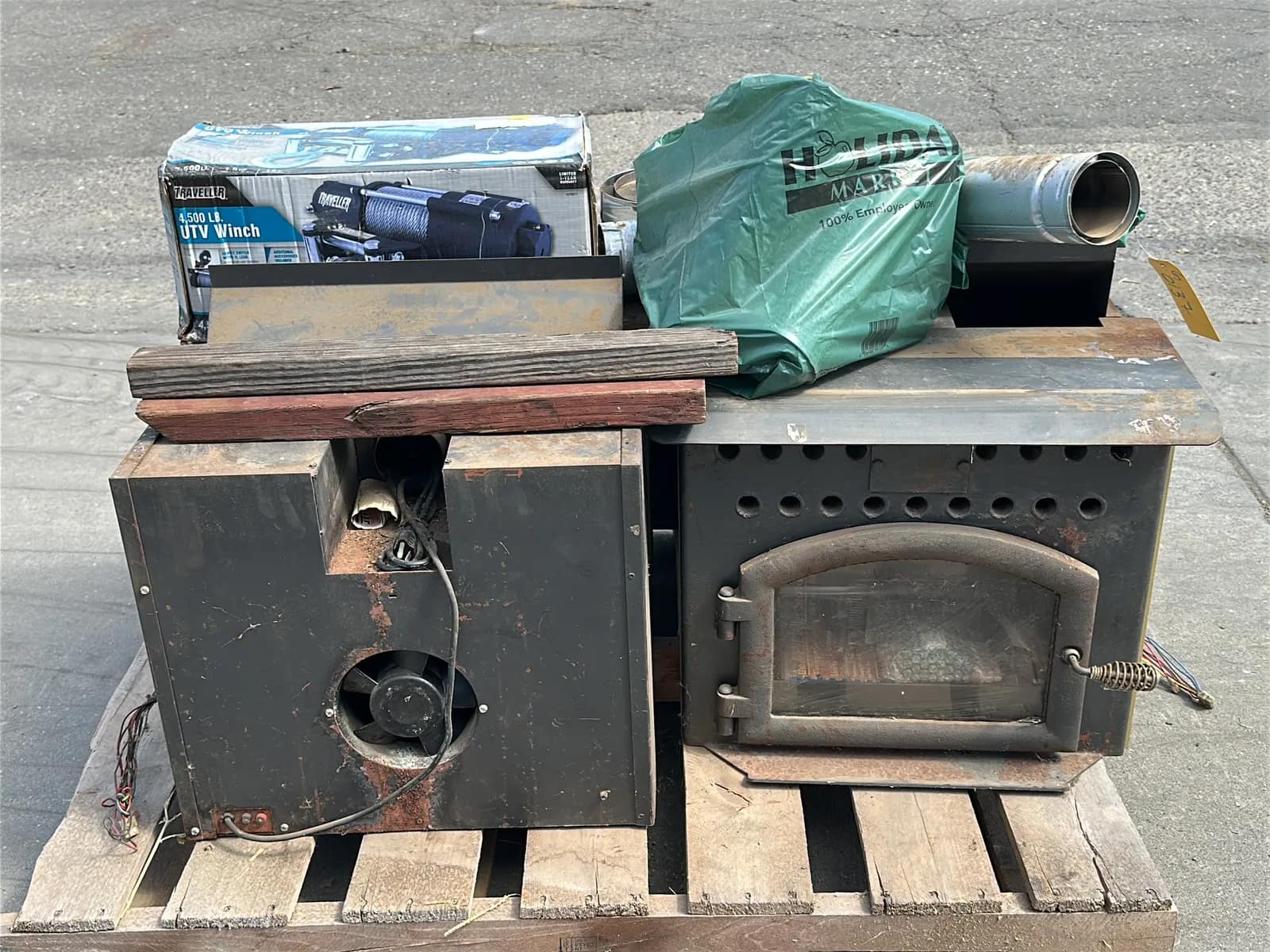 Contents Of Pallet: (2) Wood Burning Furnaces, Traveller 4,500Lb UTV Winch, (2) Car Batteries, And More, photo 10 of 10