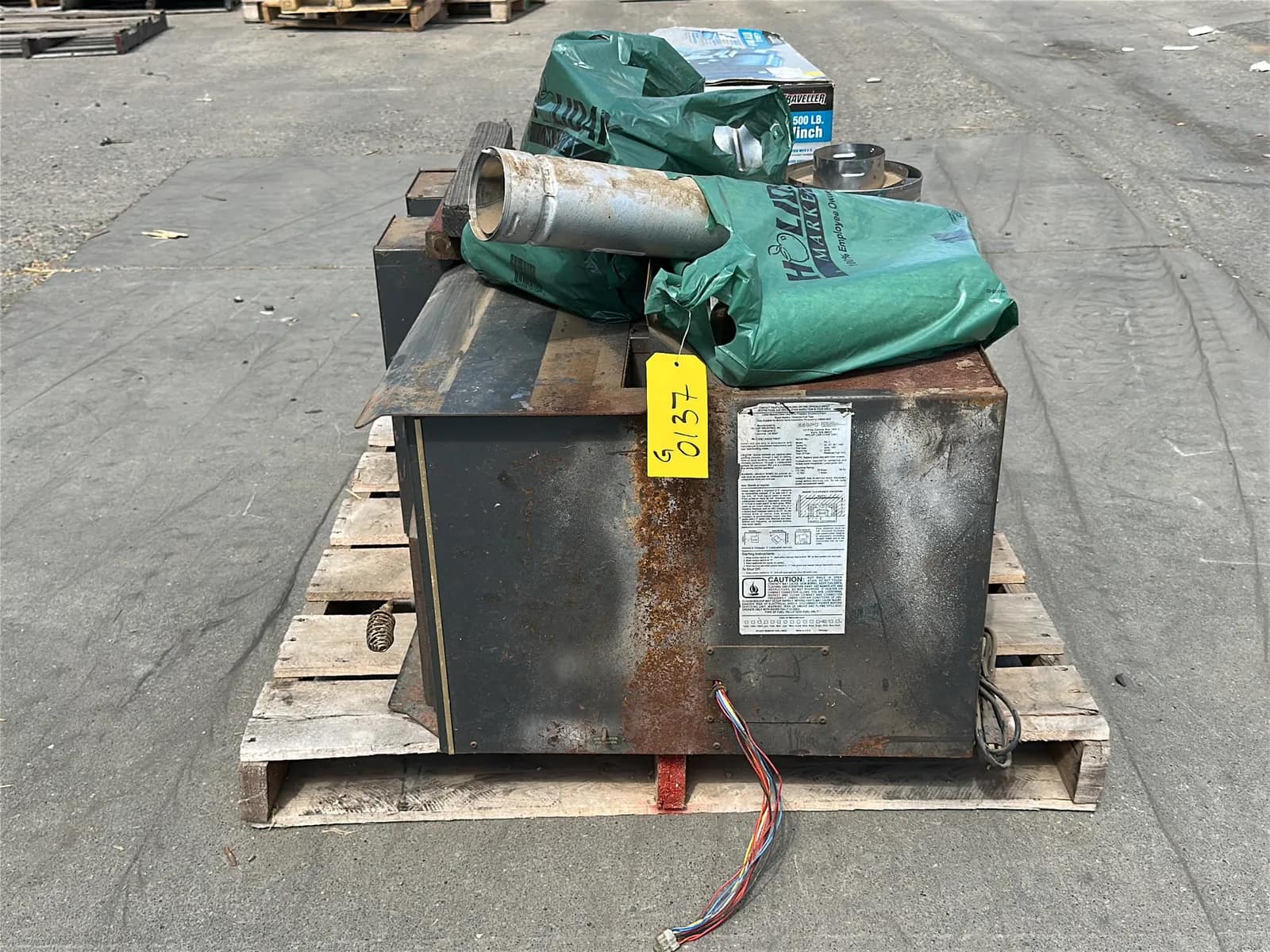 Contents Of Pallet: (2) Wood Burning Furnaces, Traveller 4,500Lb UTV Winch, (2) Car Batteries, And More, photo 1 of 10