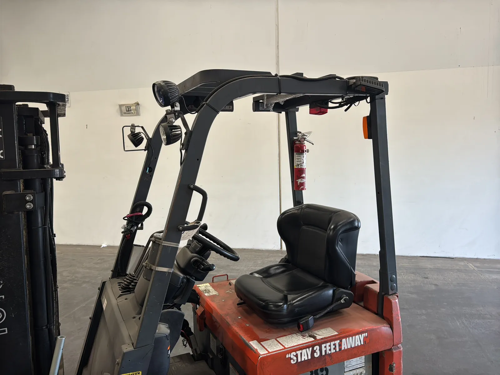 Toyota 7FBCU15 3,000lb Capacity Electric Forklift With Cascade Bale Clamp (Drives, Hydraulics Not Functioning), photo 14 of 43