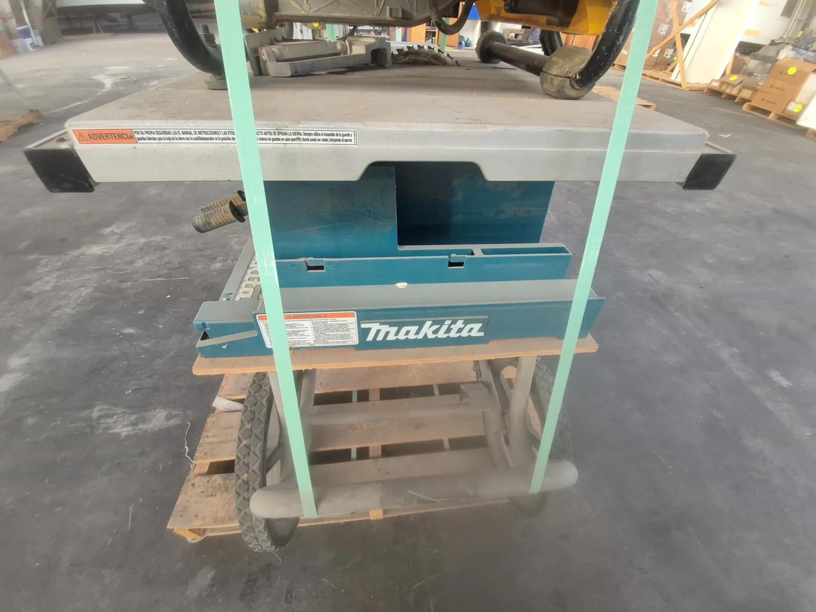 Contents Of Pallet: (1) DeWalt 10-inch Corded Table Saw, (1) Makita 10-inch Portable Table Saw, photo 8 of 9