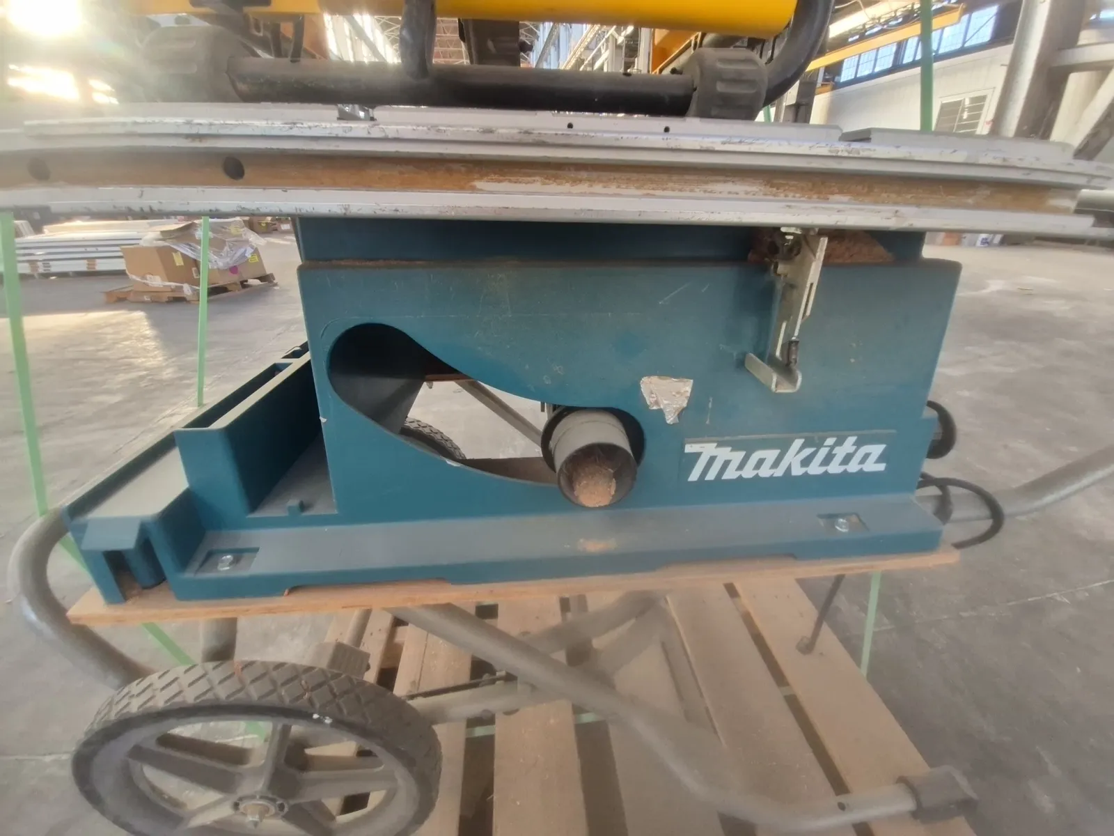 Contents Of Pallet: (1) DeWalt 10-inch Corded Table Saw, (1) Makita 10-inch Portable Table Saw, photo 7 of 9