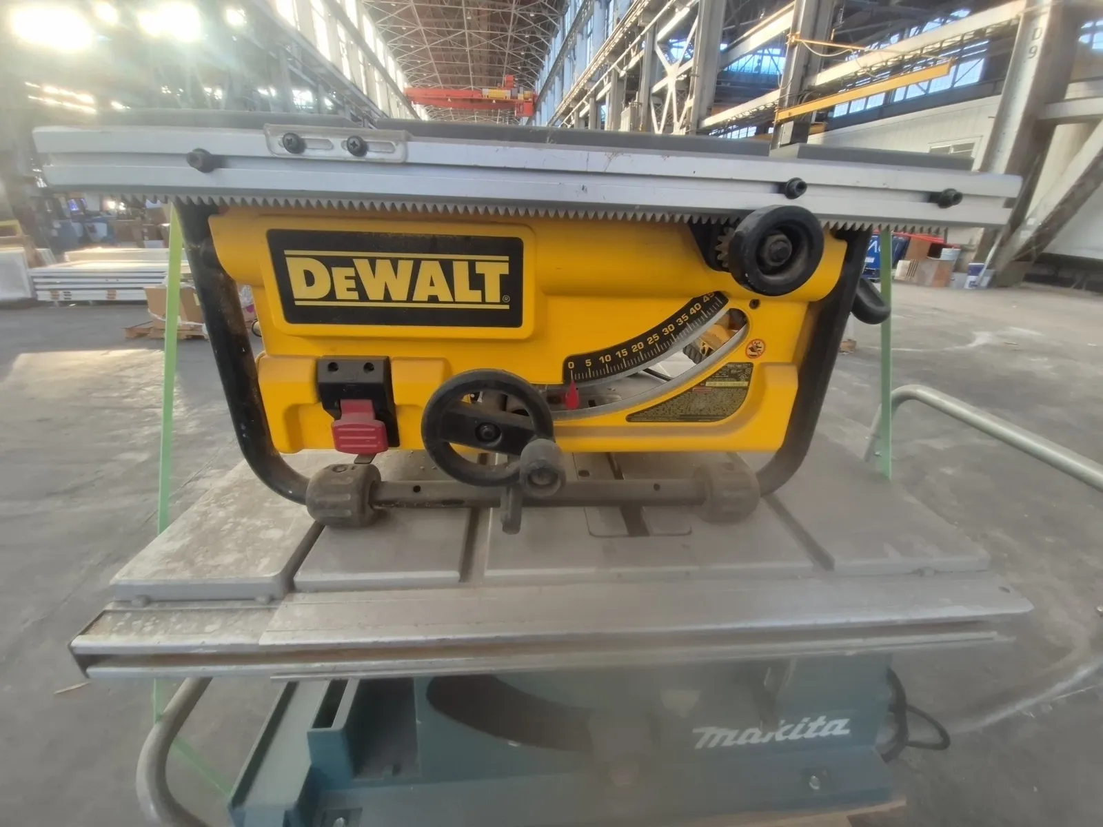 Contents Of Pallet: (1) DeWalt 10-inch Corded Table Saw, (1) Makita 10-inch Portable Table Saw, photo 5 of 9