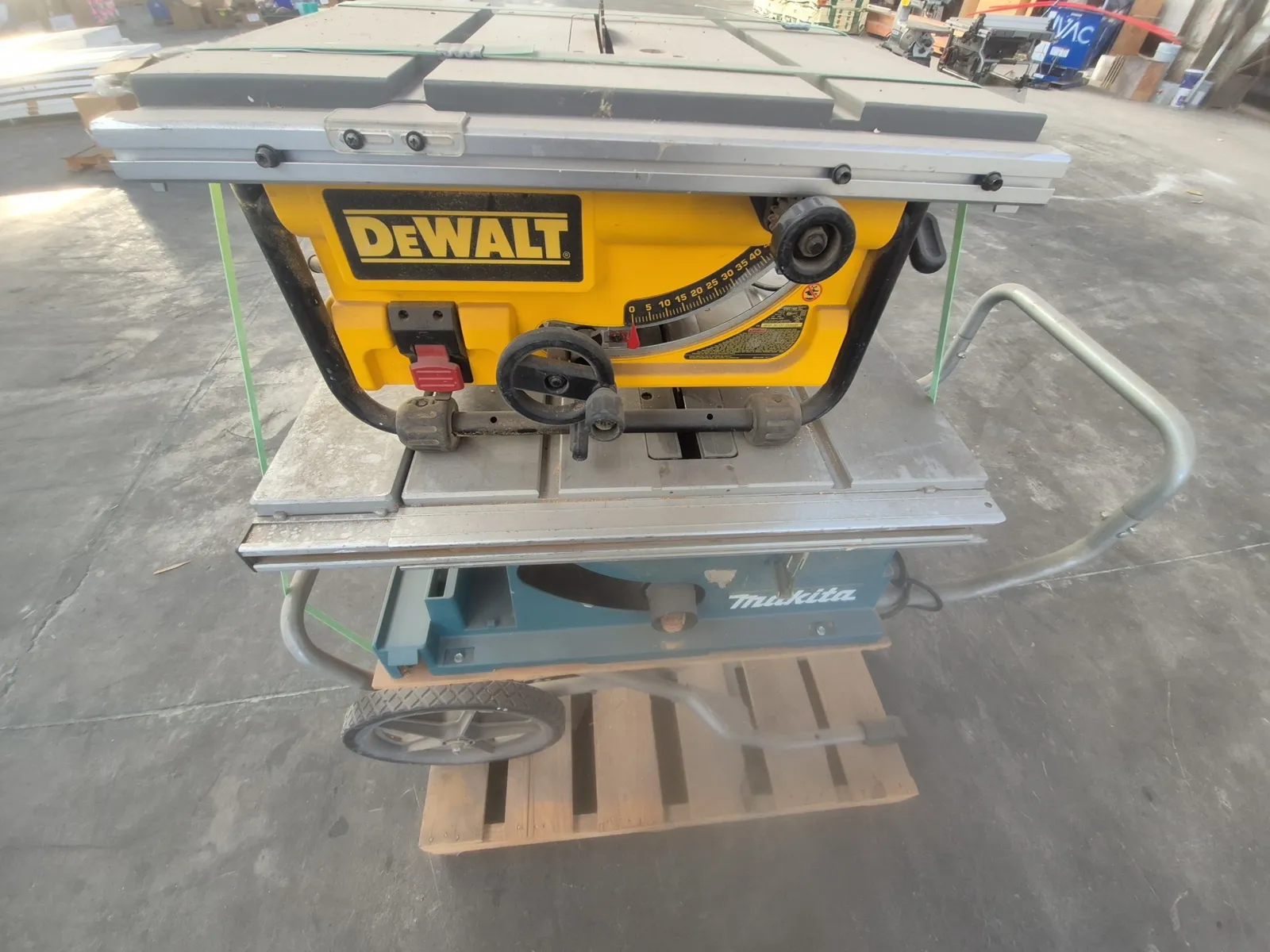 Contents Of Pallet: (1) DeWalt 10-inch Corded Table Saw, (1) Makita 10-inch Portable Table Saw, photo 4 of 9