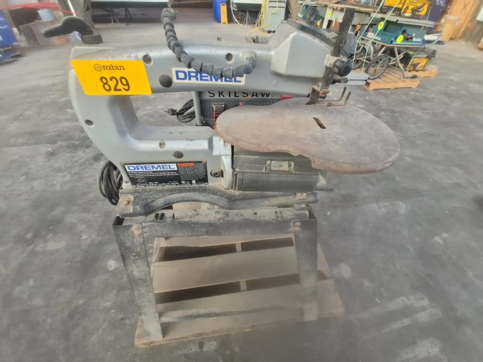 Contents Of Pallet: (1) Dremel 1680 16-inch Variable Speed Scroll Saw (1) Delta Model 36-600 10-inch Compact Cast-Iron Table Saw, photo 2 of 4