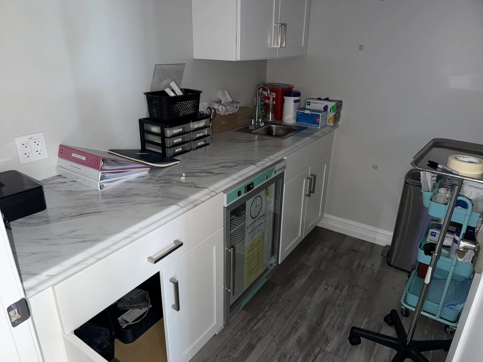 contents-of-room-medical-supplies-and-fridge-mvh77qa7