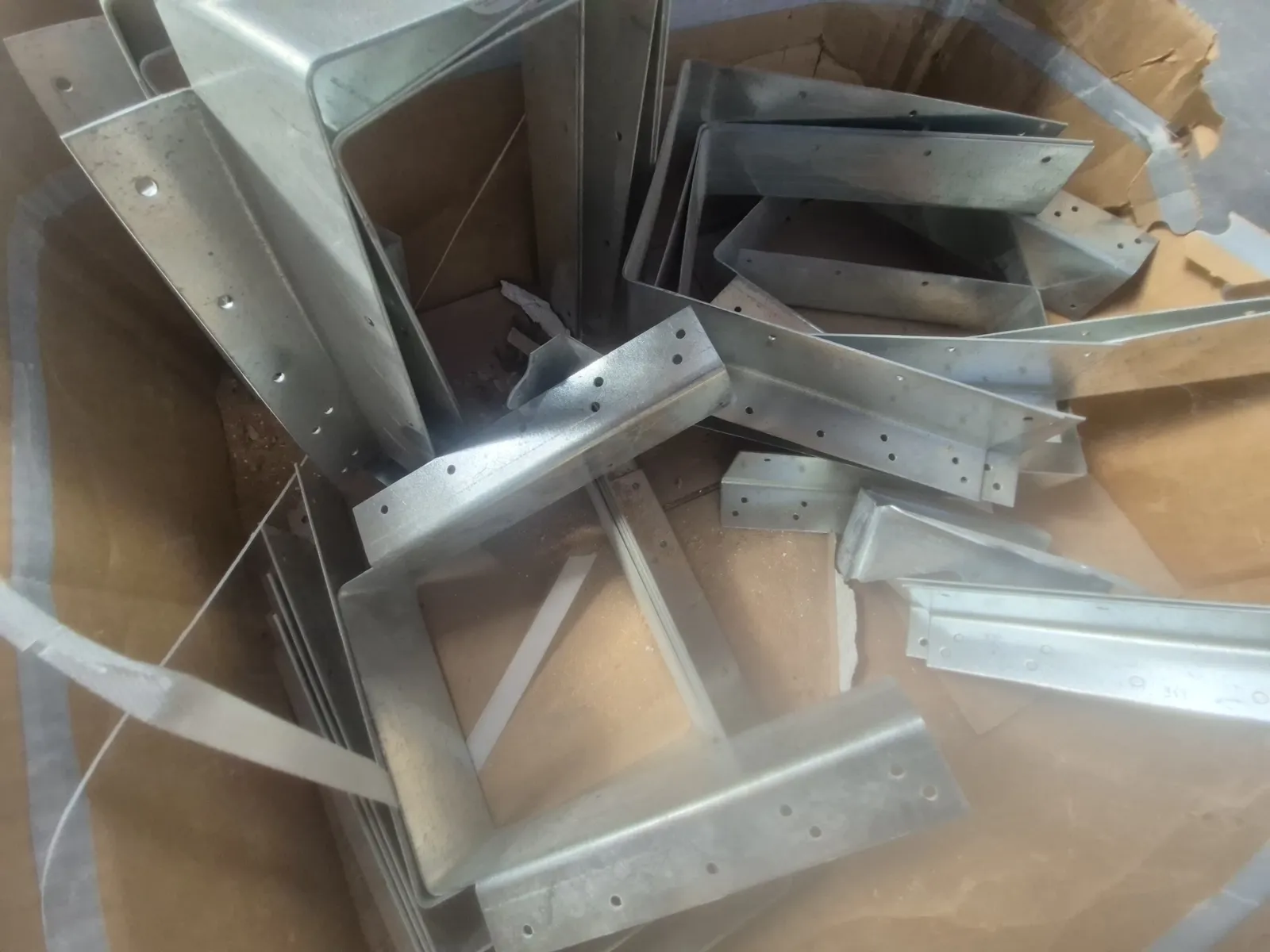 Contents Of Pallet: Assortment Of Galvanized Steel Framing Hardware, Galvanized Face-Mount Joist Hangers, photo 2 of 4