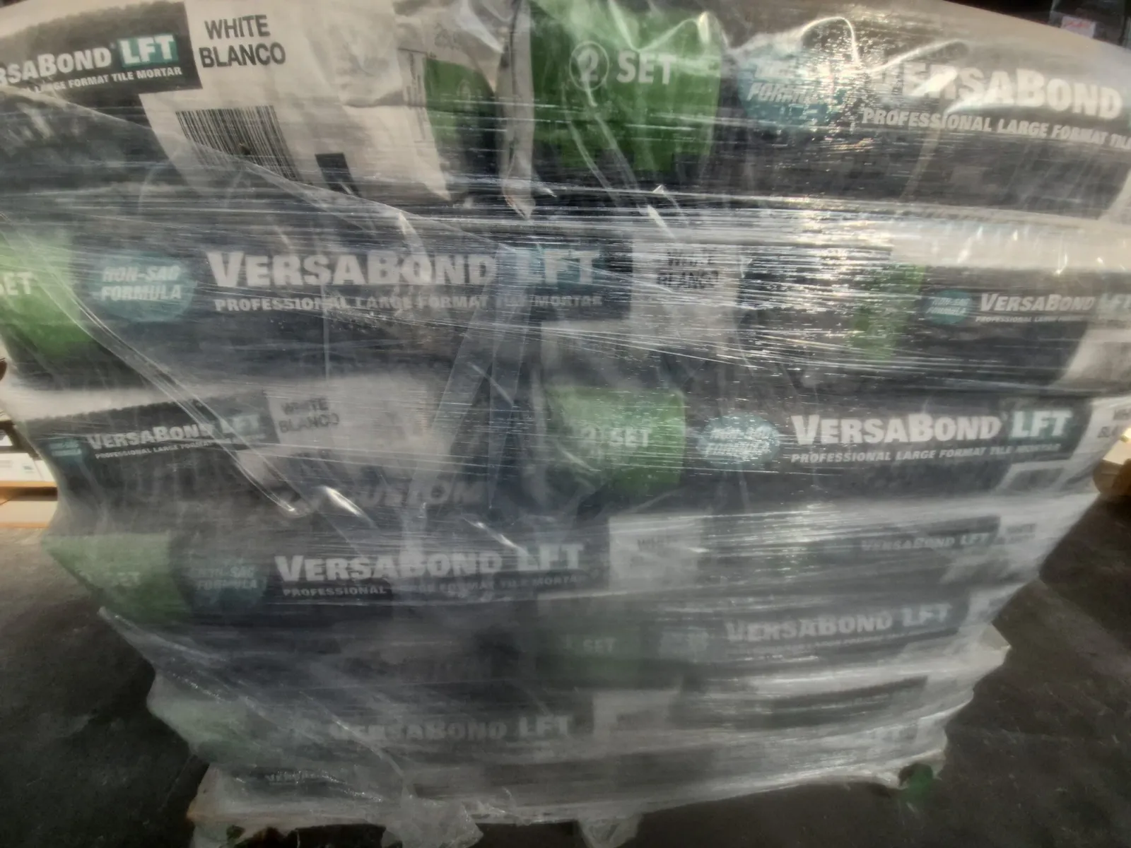 Contents Of Pallet: Approximately (30) Bags - VersaBond, Tile Mortar, photo 2 of 3
