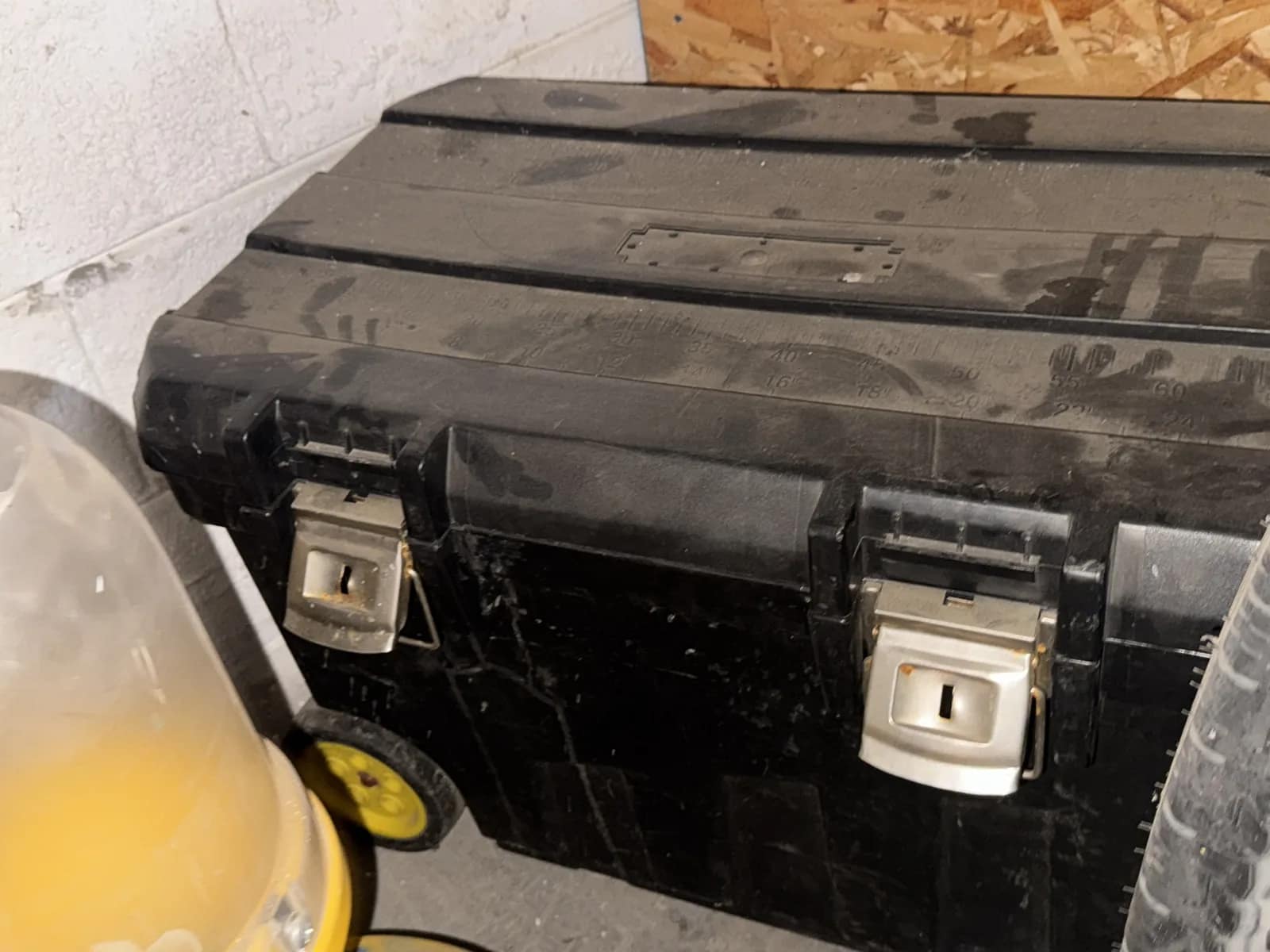 Contents Under Staircase: (2) Tires, Rolling Toolbox, Job-site Light Extension Cords, And Bricks., photo 14 of 15
