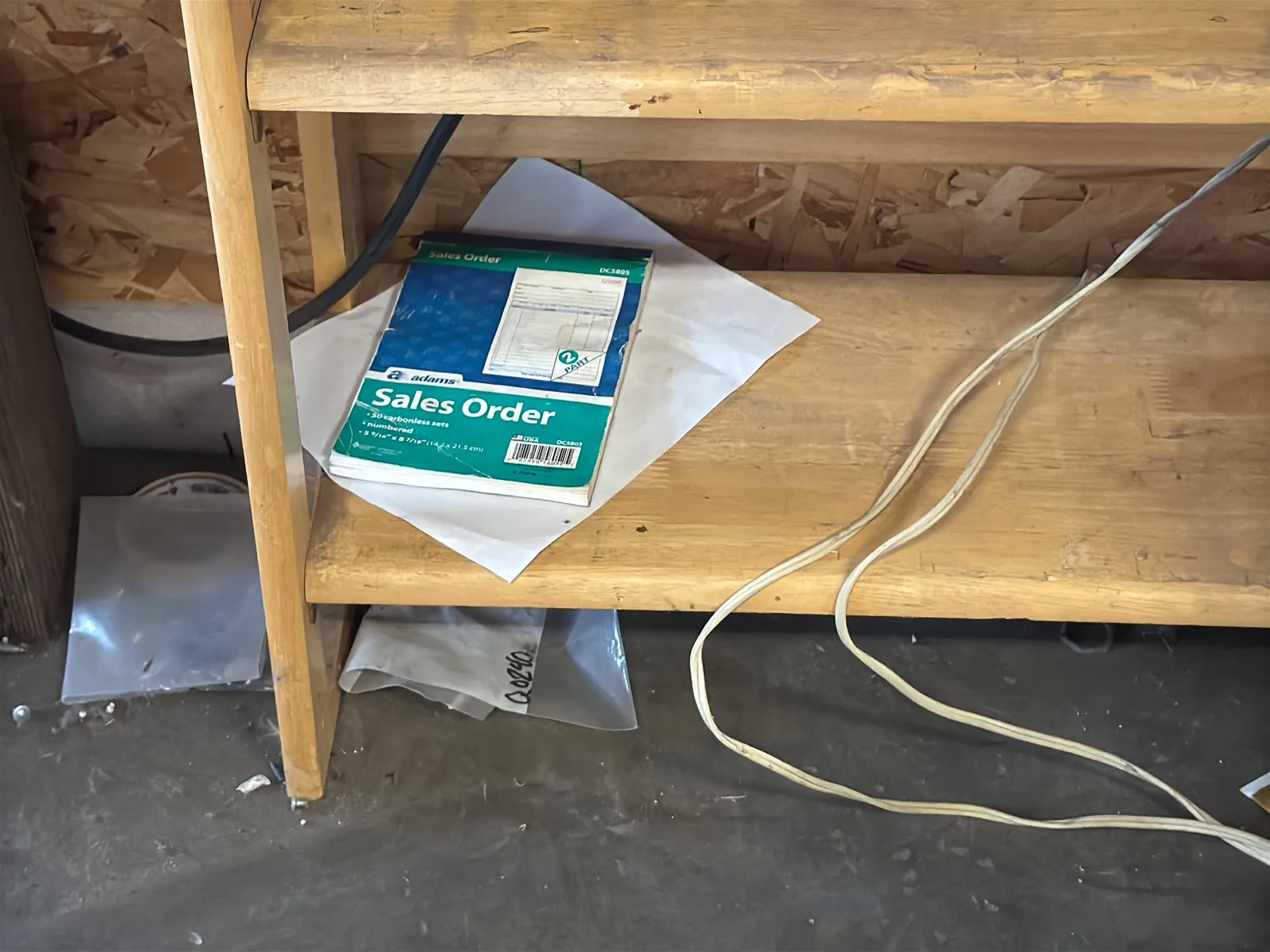 Bookshelf And Contents: Phone, And Entrance Zipper, photo 7 of 8