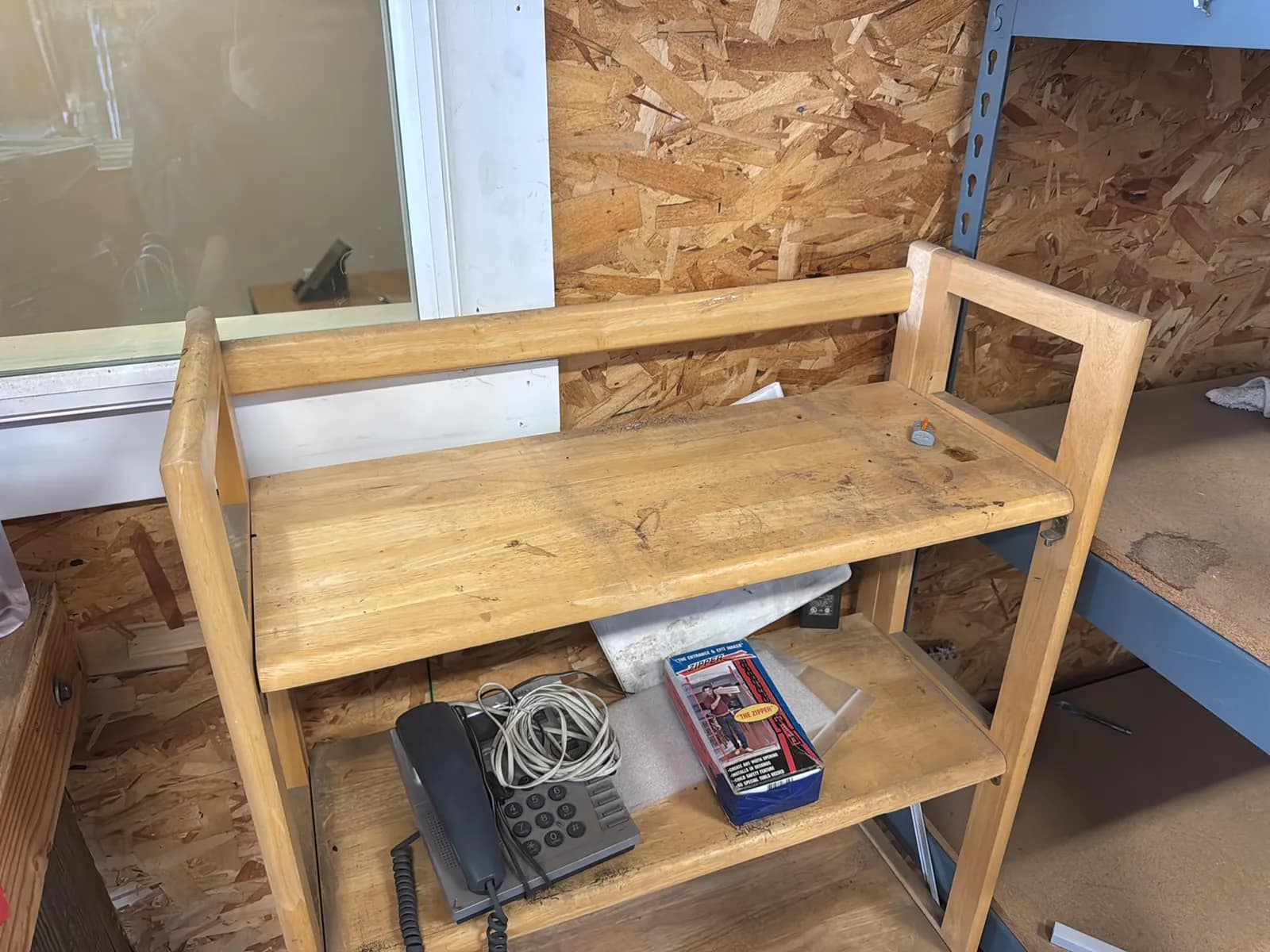 Bookshelf And Contents: Phone, And Entrance Zipper, photo 2 of 8